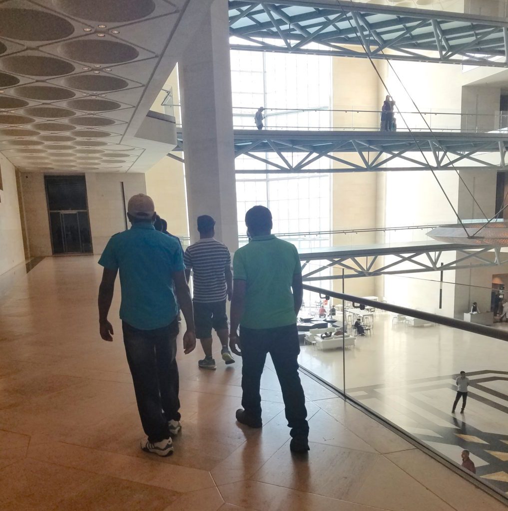 Male workers at the Museum of Islamic Art in Doha, Qatar