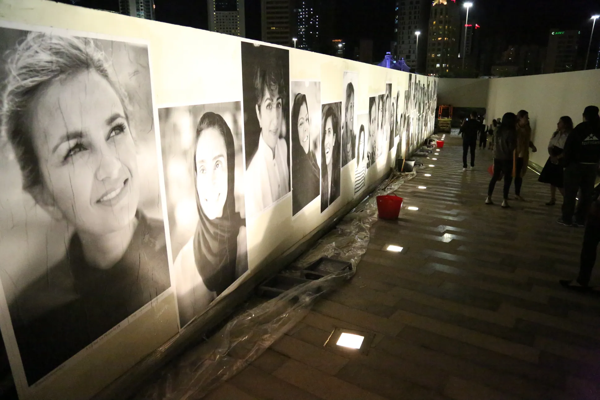 Portraits of women featured in WEORITU's #WeCanDoIt documentary on a wall in Al Shaheed Park, Kuwait City. (WEORITU)