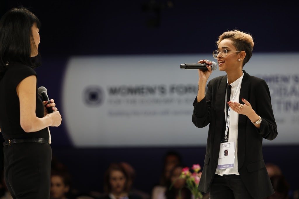 Amaani speaking at the Women's Forum for the Economy and Society (Amaani Yahya)