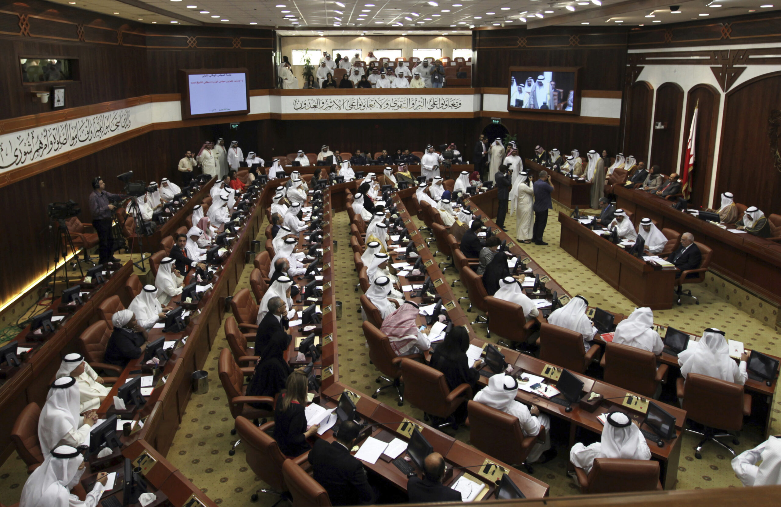 Bahraini lawmakers participate in a session of parliament convened in Manama, Bahrain, July 28, 2013. (AP Photo/Hasan Jamali)
