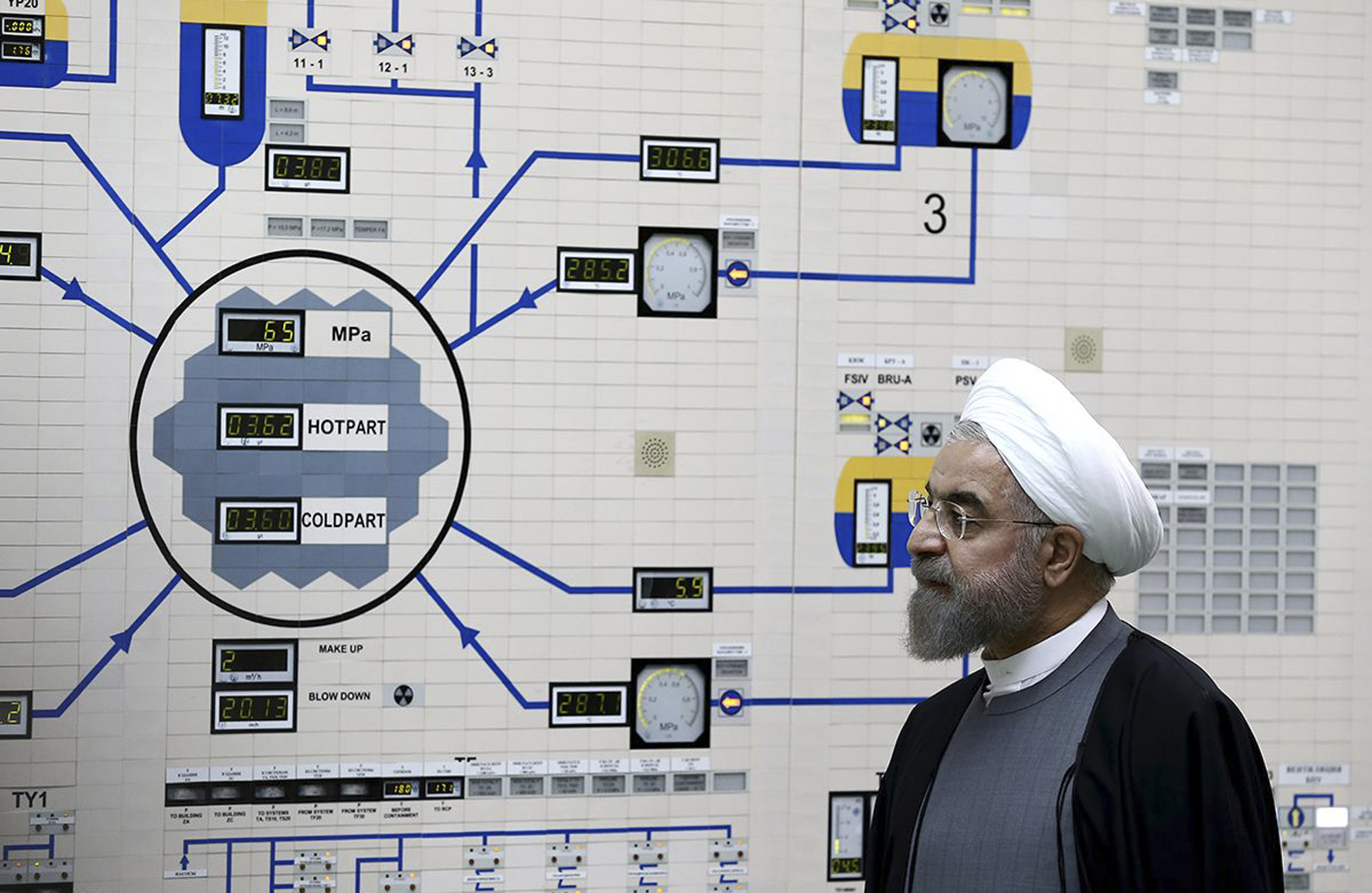 Iranian President Hassan Rouhani visits the Bushehr nuclear power plant just outside of Bushehr, Iran, Jan. 13, 2015. (AP Photo/Iranian Presidency Office, Mohammad Berno)