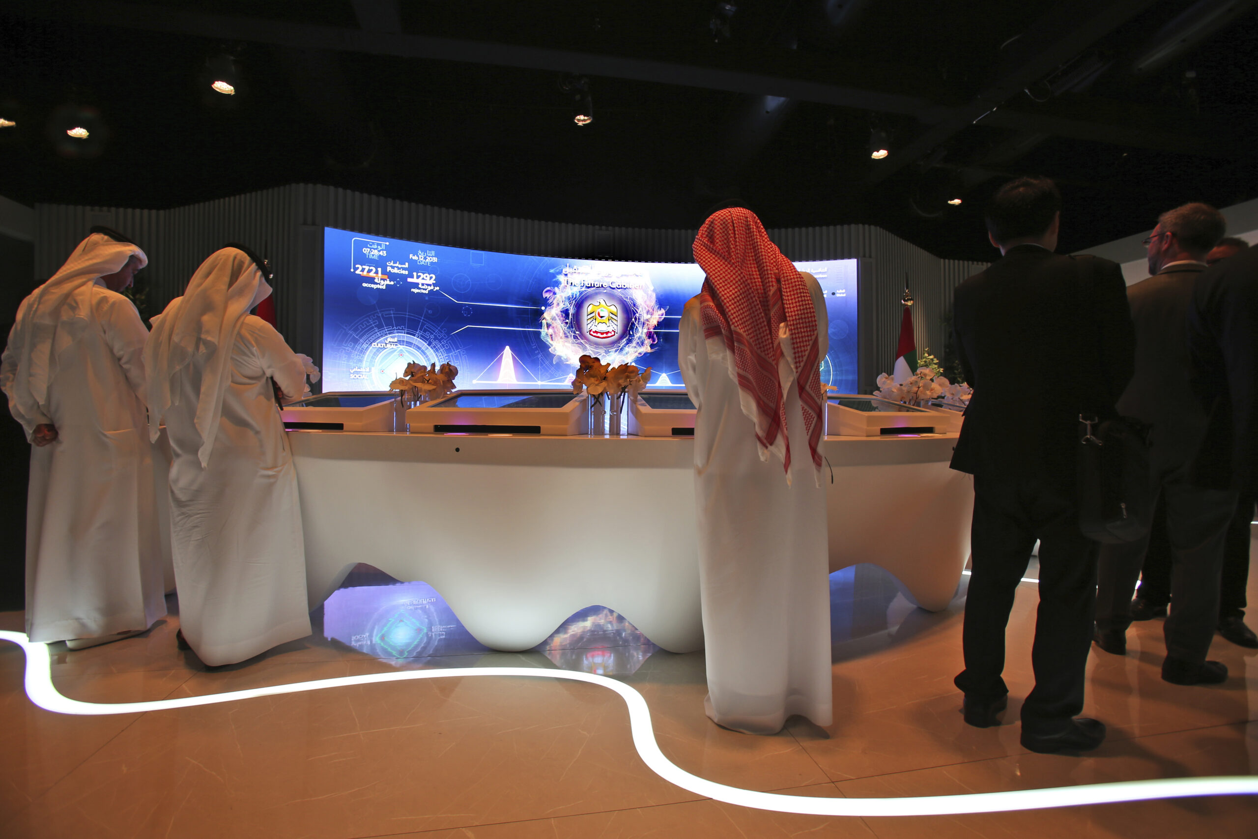 Visitors at the Future Government section of the Museum of the Future at the World Government Summit in Dubai, United Arab Emirates, Feb. 12, 2018. (AP Photo/Kamran Jebreili)