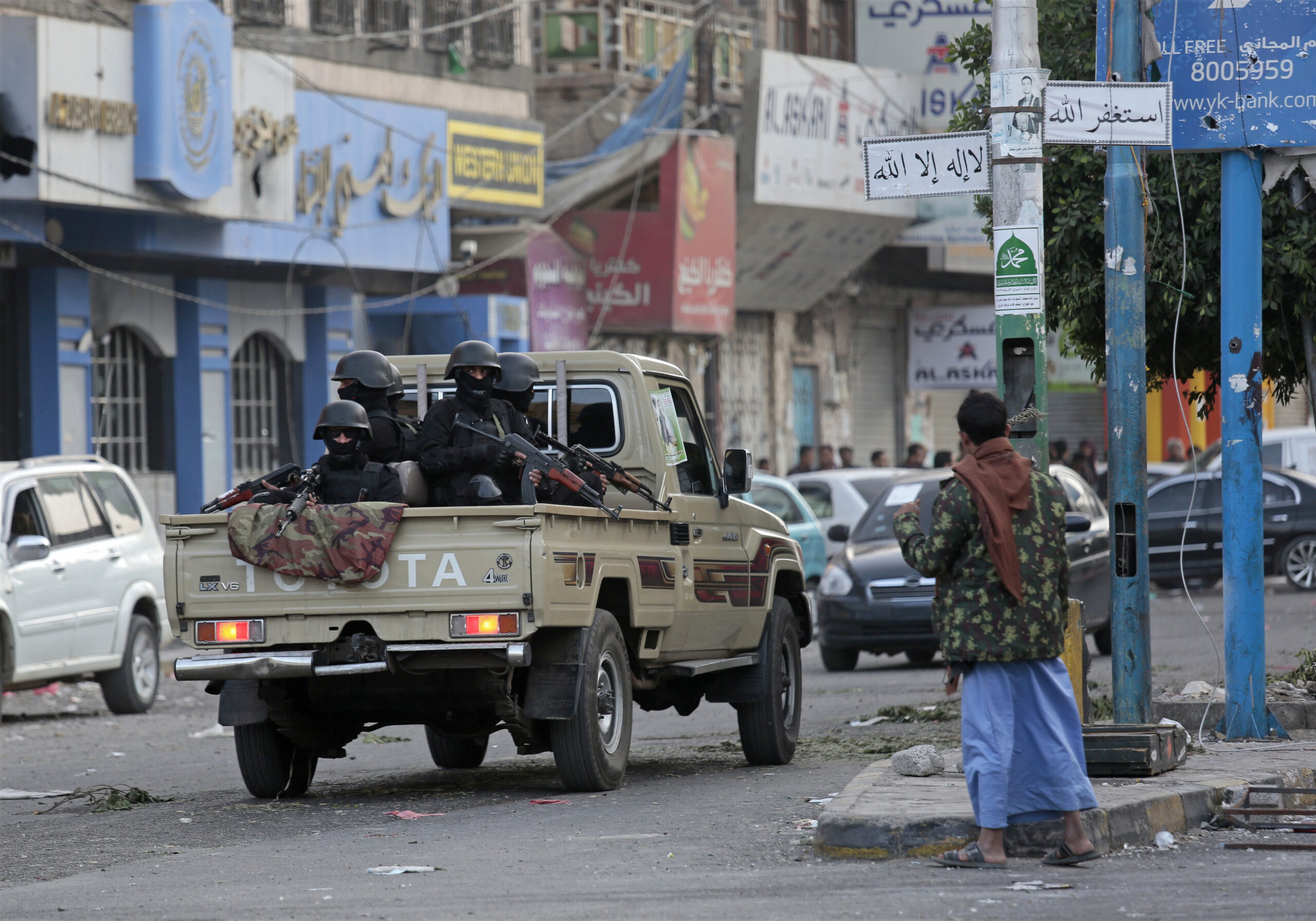 Houthi fighters ride on a vehicle as they patrol a street in Sanaa, Yemen, Dec. 4, 2017. (AP Photo/Hani Mohammed)