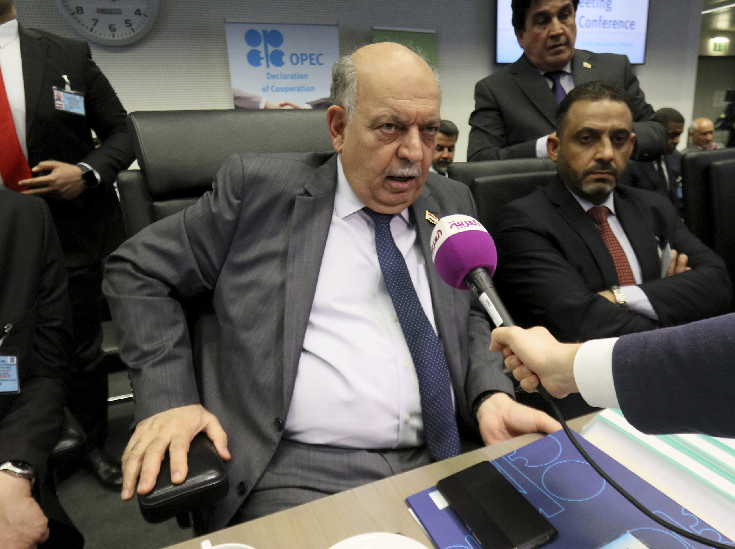 Iraqi Deputy Prime Minister for Energy Affairs and Oil Minister Thamir Ghadhban speaks prior to the start of an OPEC meeting in Vienna, Austria, July 1. (AP Photo/Ronald Zak)