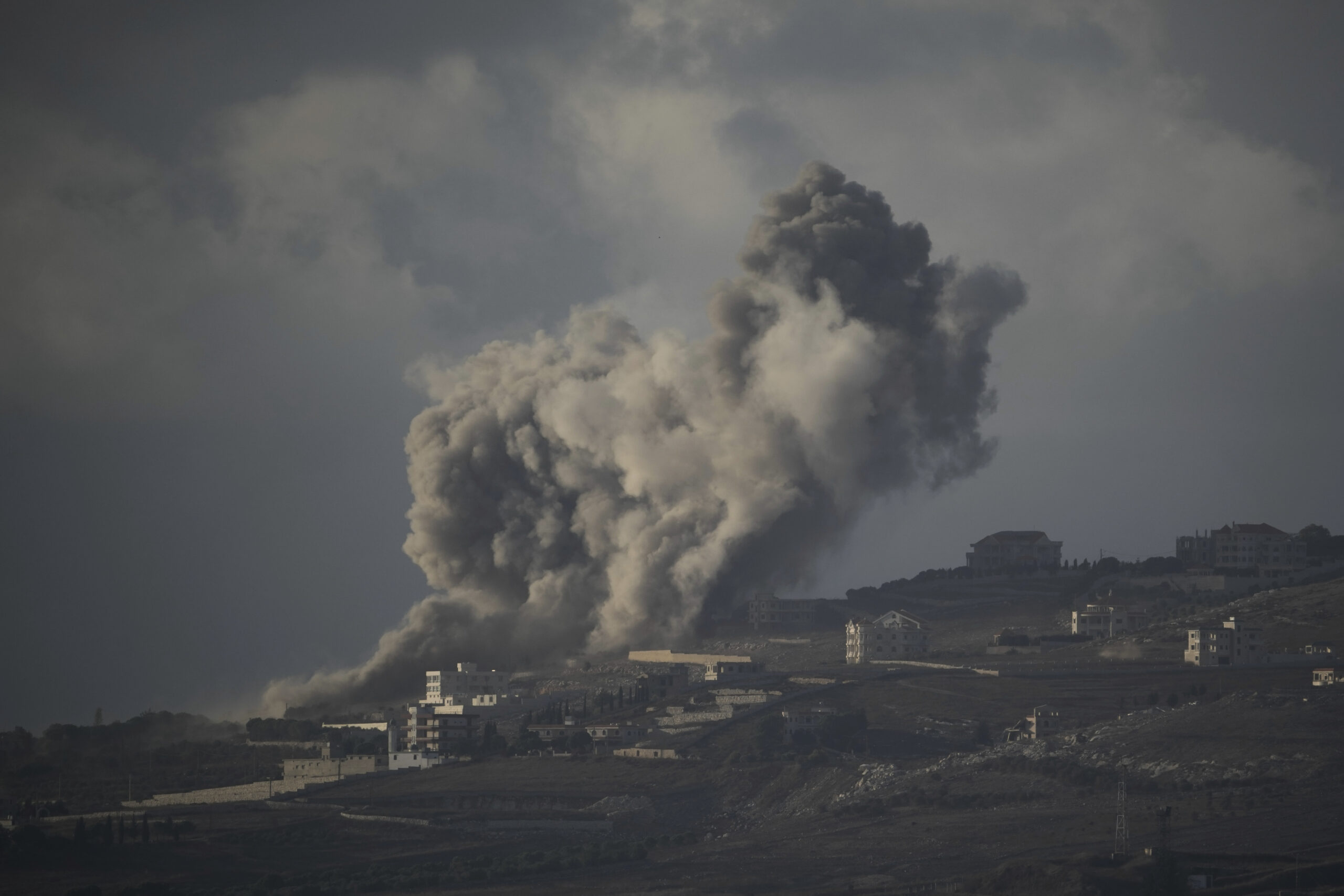 Smoke rises following Israeli bombardment in southern Lebanon as seen from northern Israel, October 1. (AP Photo/Leo Correa)