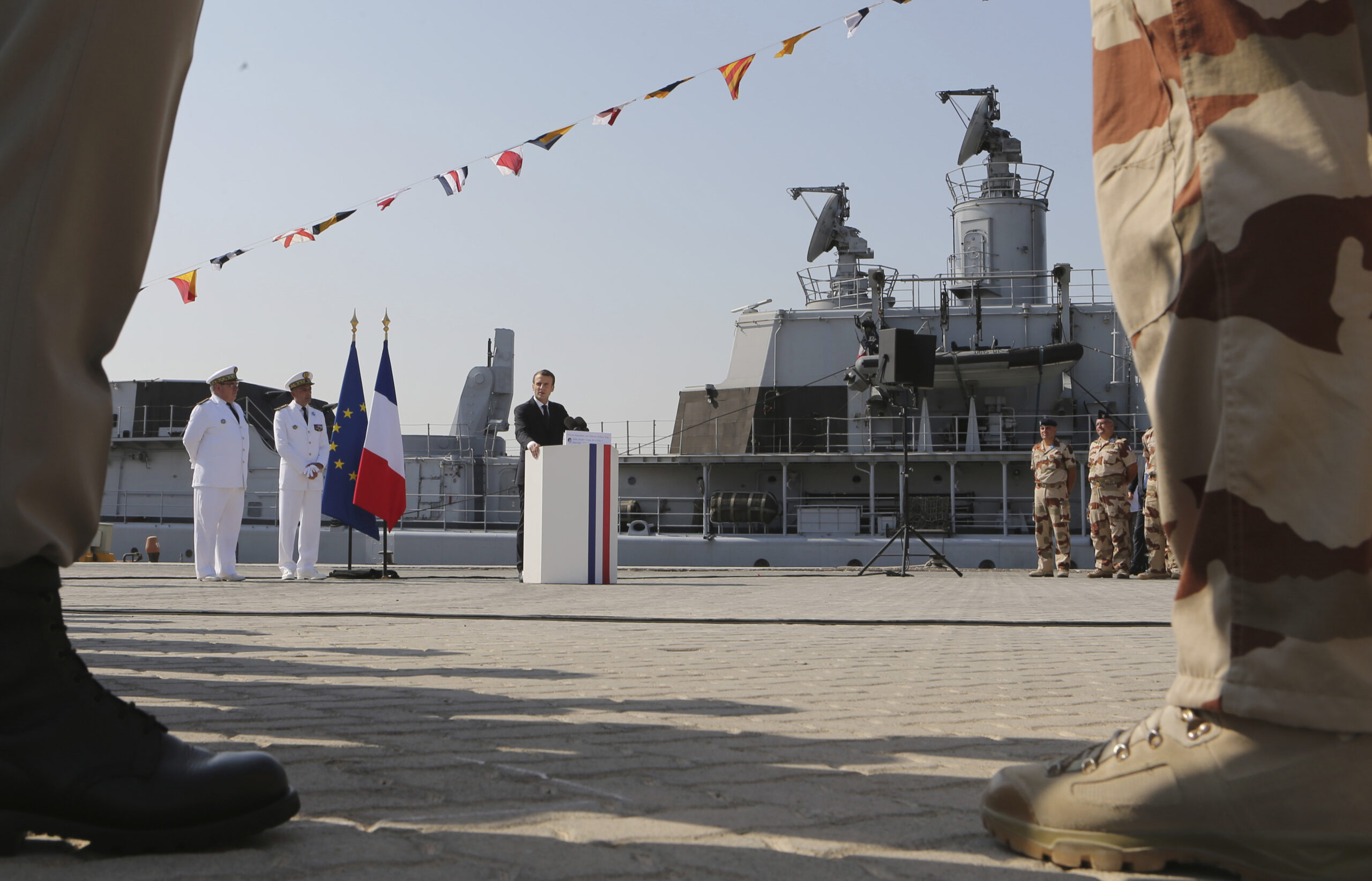 French President Emmanuel Macron talks to French military personnel at the French naval base in Abu Dhabi, United Arab Emirates, Nov. 9, 2017. (AP Photo/Kamran Jebreili)