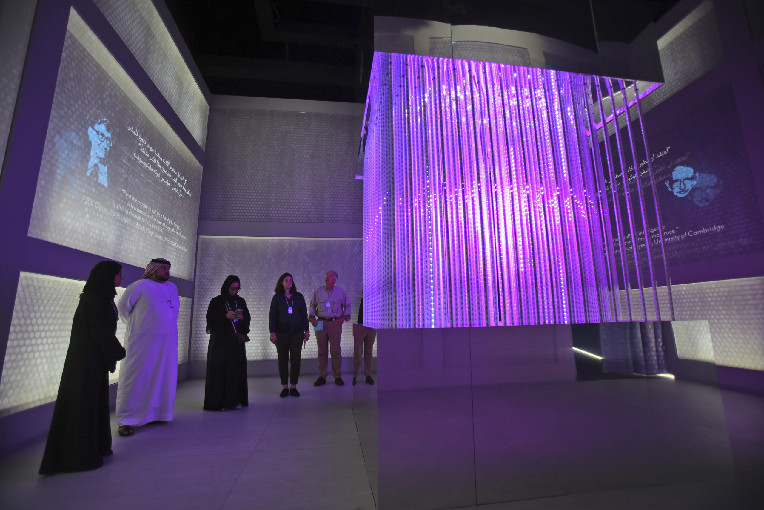 Visitors at the the Artificial Intelligence presentation of the Museum of the Future at the World Government Summit in Dubai, United Arab Emirates, Monday, Feb. 12, 2018. (AP Photo/Kamran Jebreili)