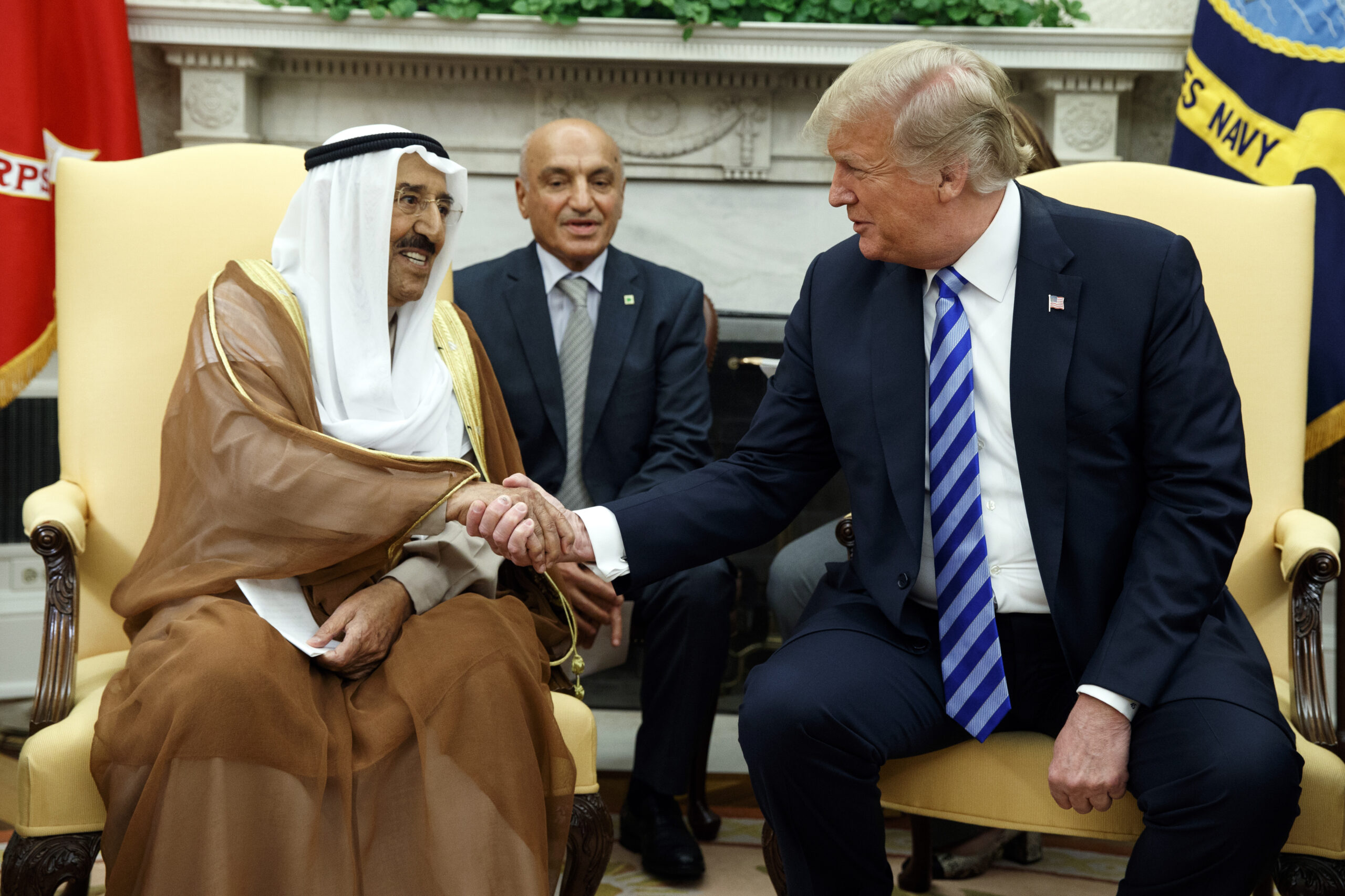 U.S. President Donald J. Trump shakes hands as he meets with Kuwaiti Emir Sabah al-Ahmed al-Sabah in the Oval Office of the White House, Washington, DC, Sept. 5, 2018. (AP Photo/Evan Vucci)