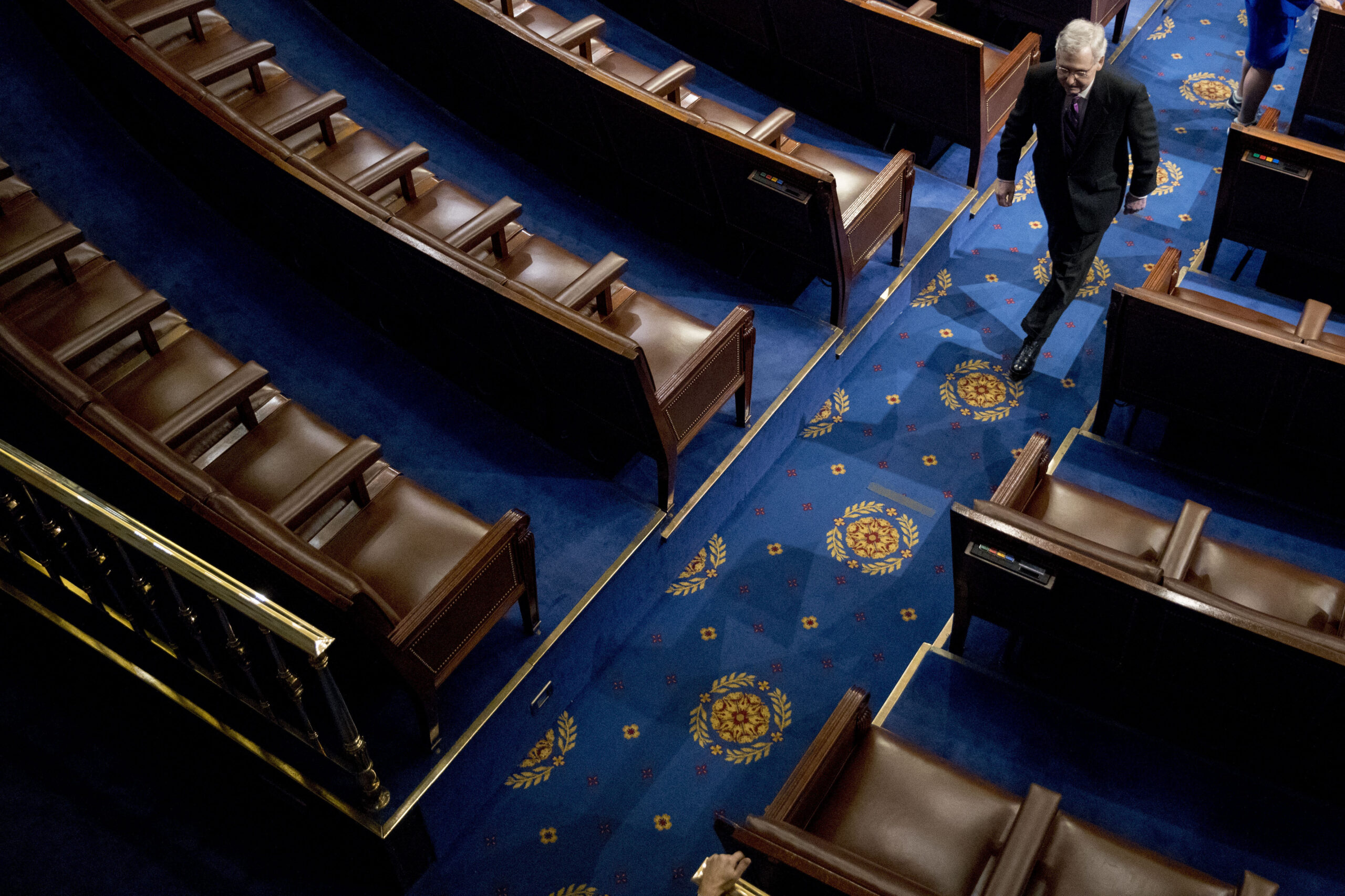 U.S. Senate Majority Leader Mitch McConnell, walks off the House floor, Capitol Hill, Washington, DC, April 3. AP Photo/Andrew Harnik)