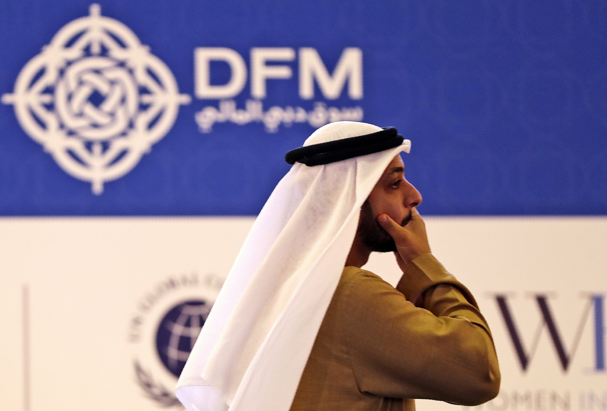 An Emirati trader reacts to the latest news at the Dubai Financial Market in Dubai, United Arab Emirates, March 9. (AP Photo/Kamran Jebreili)
