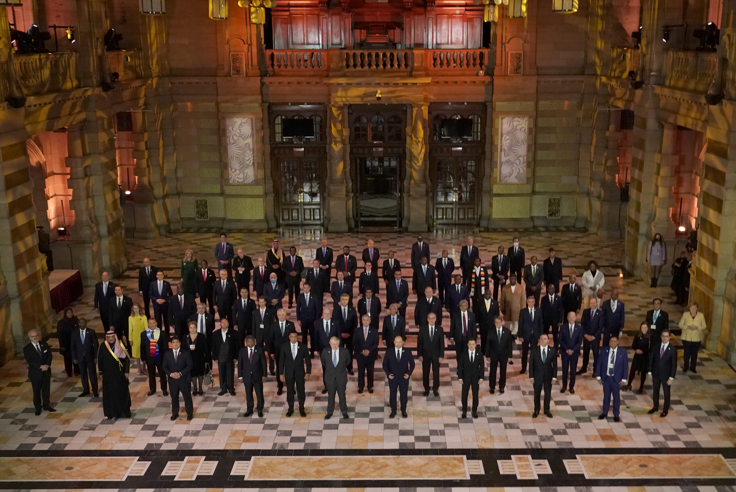 World leaders pose for a group photo during an evening reception to mark the opening day of the COP26 United Nations Climate Summit, Glasgow, Scotland, Nov. 1, 2021. (AP Photo/Alberto Pezzali)