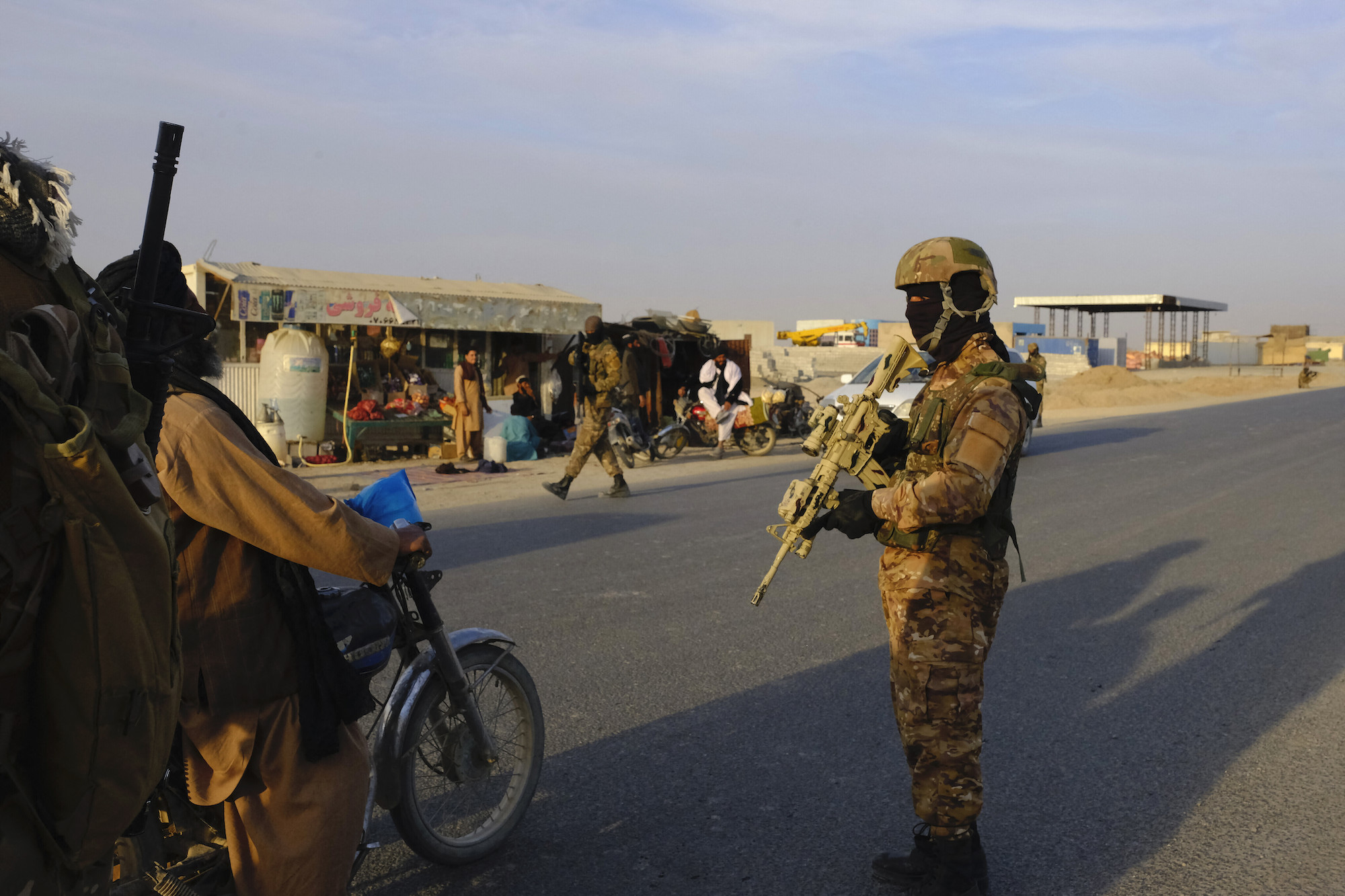 Taliban special forces units conduct searches at a checkpoint in Lashkargah, Afghanistan, Nov. 29, 2021. (Photo by Alfred Yaghobzadeh/Abaca/Sipa USA – Sipa via AP Images)
