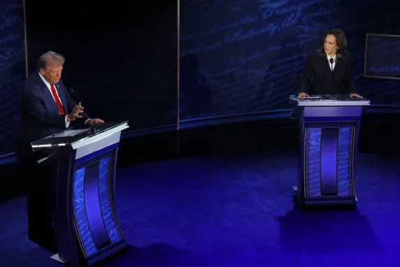 Republican presidential nominee former President Donald J. Trump gestures as he speaks as Democratic presidential nominee Vice President Kamala Harris listens during a presidential debate hosted by ABC in Philadelphia, Pennsylvania, September 10. (REUTERS/Brian Snyder)