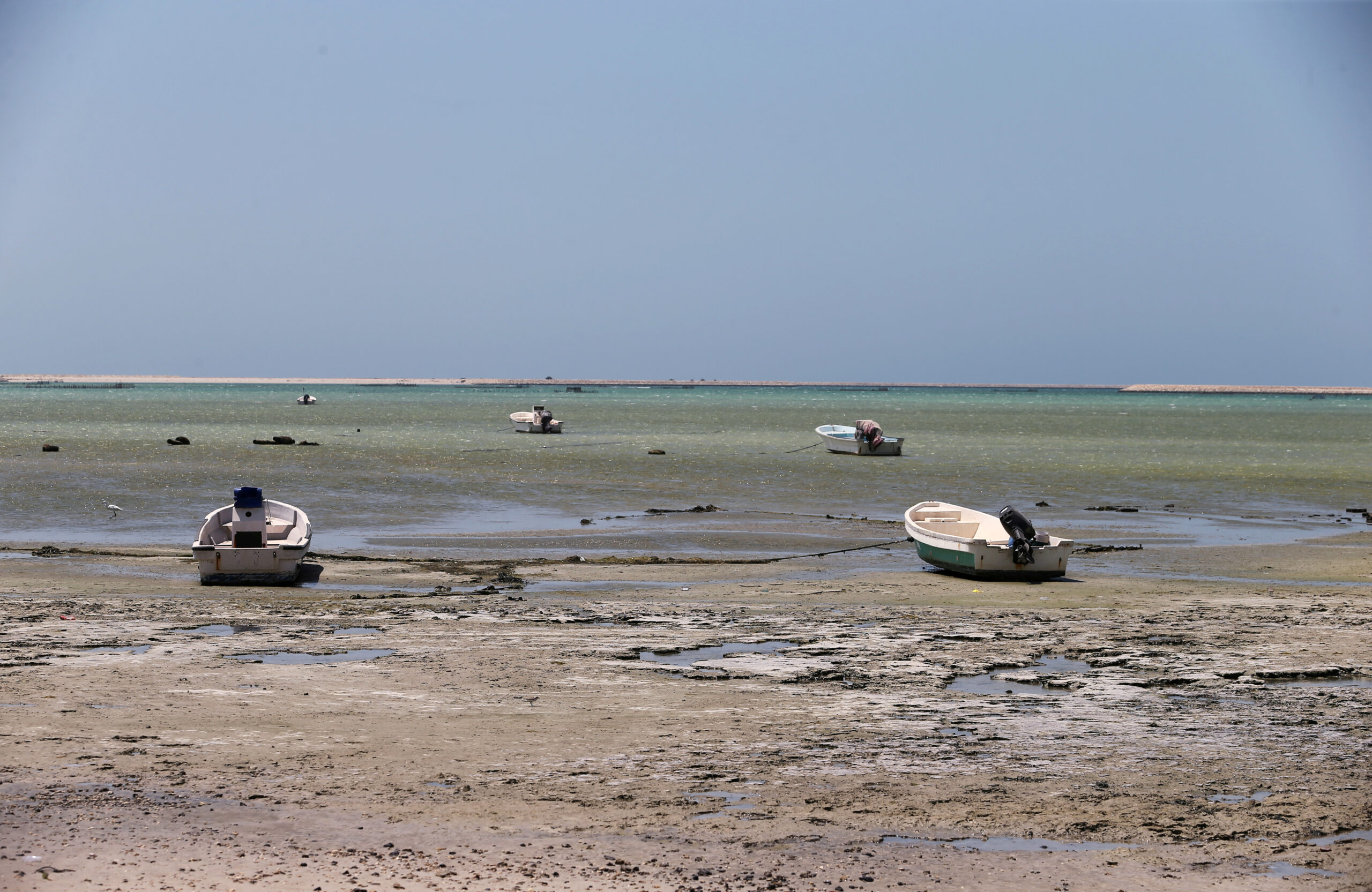 Fishing boats are left abandoned as sea dries off due to land reclamation in Budaiya west of Manama, Bahrain, June 19, 2019. (REUTERS/Hamad I Mohammed)