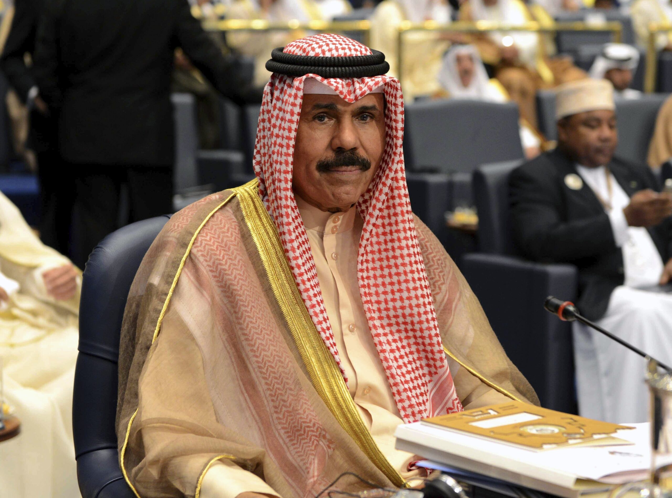 Late Kuwaiti Emir Nawaf al-Ahmed al-Sabah, then crown prince, attends the closing session of the 25th Arab Summit at Bayan Palace in Kuwait City, March 26, 2014. (AP Photo/Nasser Waggi, File)