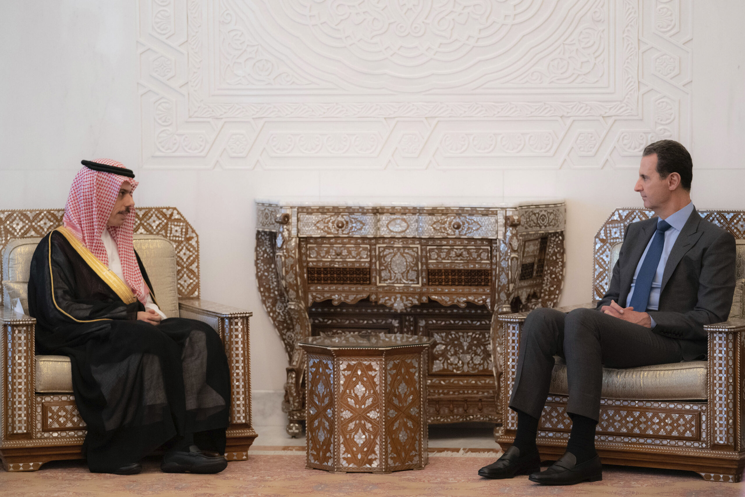 Syrian President Bashar al-Assad, right, meets with Saudi Minister of Foreign Affairs Prince Faisal bin Farhan, left, in Damascus, Syria, Tuesday, April 18. (AP Photo)