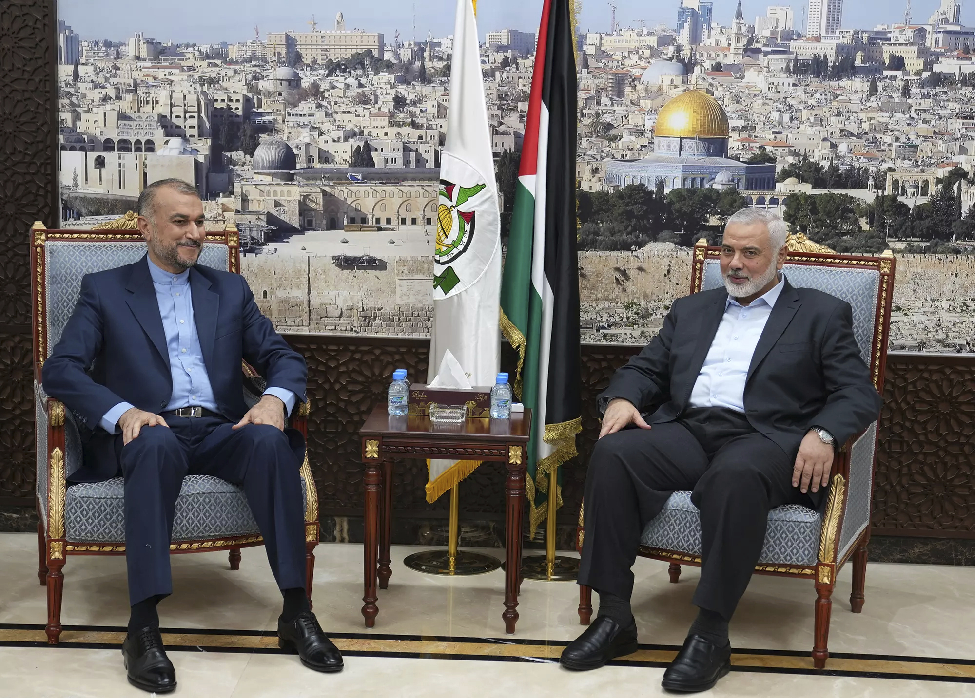 Iranian Foreign Minister Hossein Amir-Abdollahian, left, meets with Hamas chief Ismail Haniyeh in Doha, Qatar, Oct. 31. (Iranian Foreign Ministry via AP)