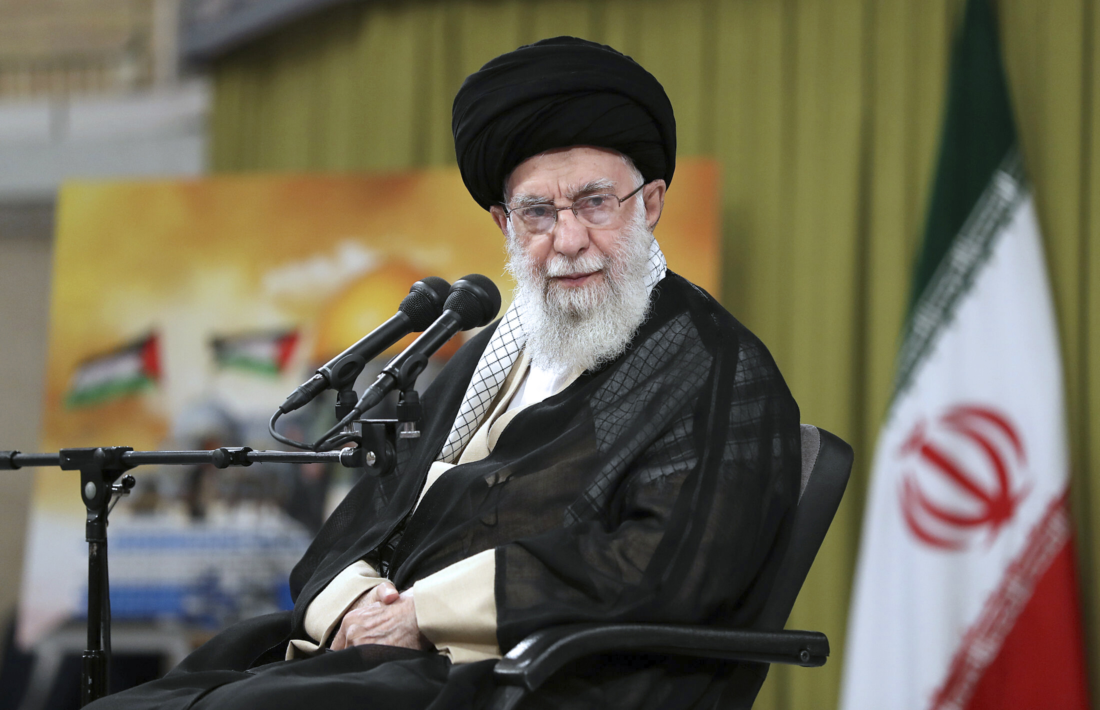 In this photo released by the official website of the office of the Iranian supreme leader, Supreme Leader Ayatollah Ali Khamenei attends a meeting with a group of students in Tehran, Iran, Nov. (Office of the Iranian Supreme Leader via AP)