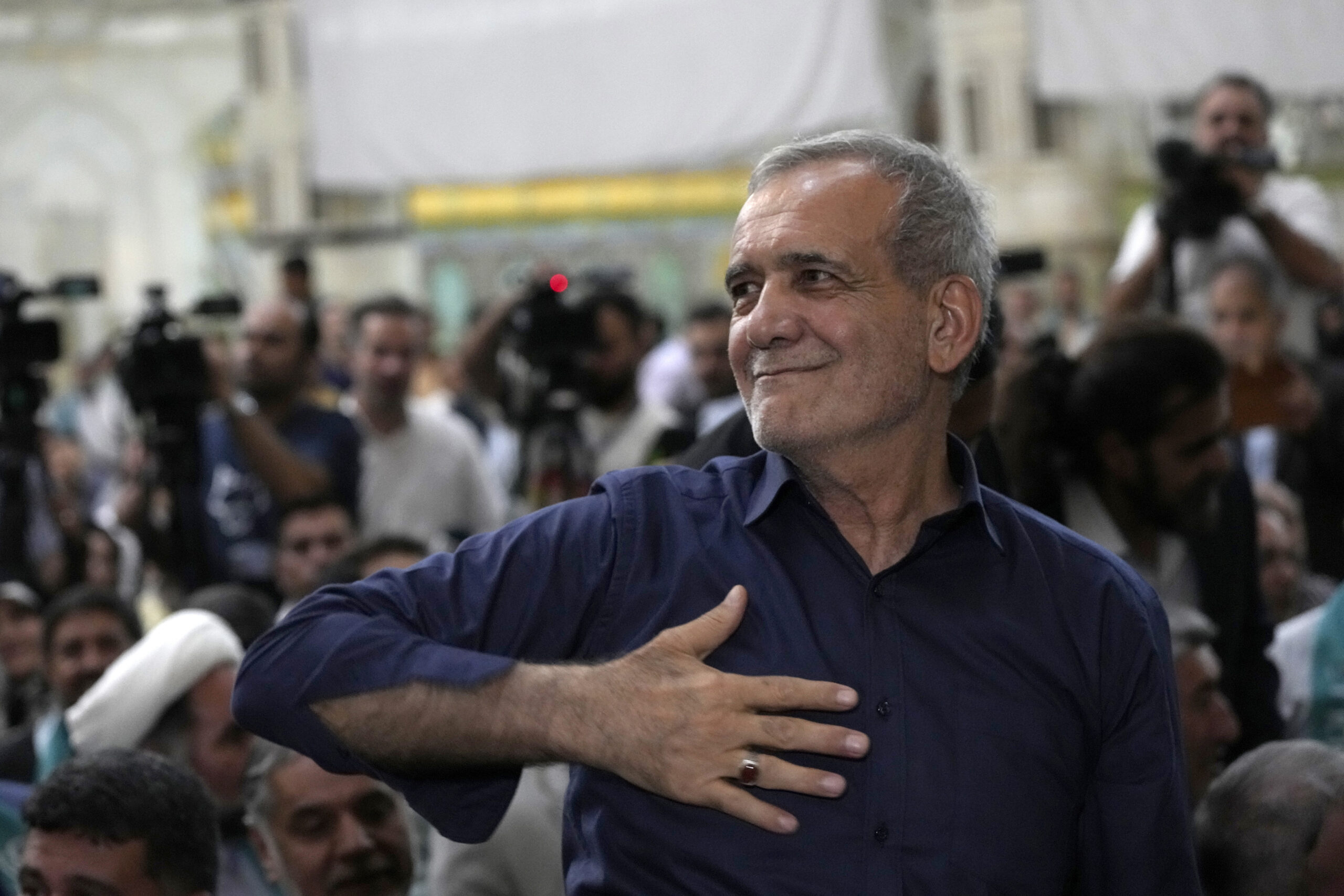 Iran's President-elect Masoud Pezeshkian greets his supporters in a meeting a day after the presidential election, at the shrine of the late revolutionary founder Ayatollah Khomeini, outside Tehran, Iran, July 6. (AP Photo/Vahid Salemi, File)