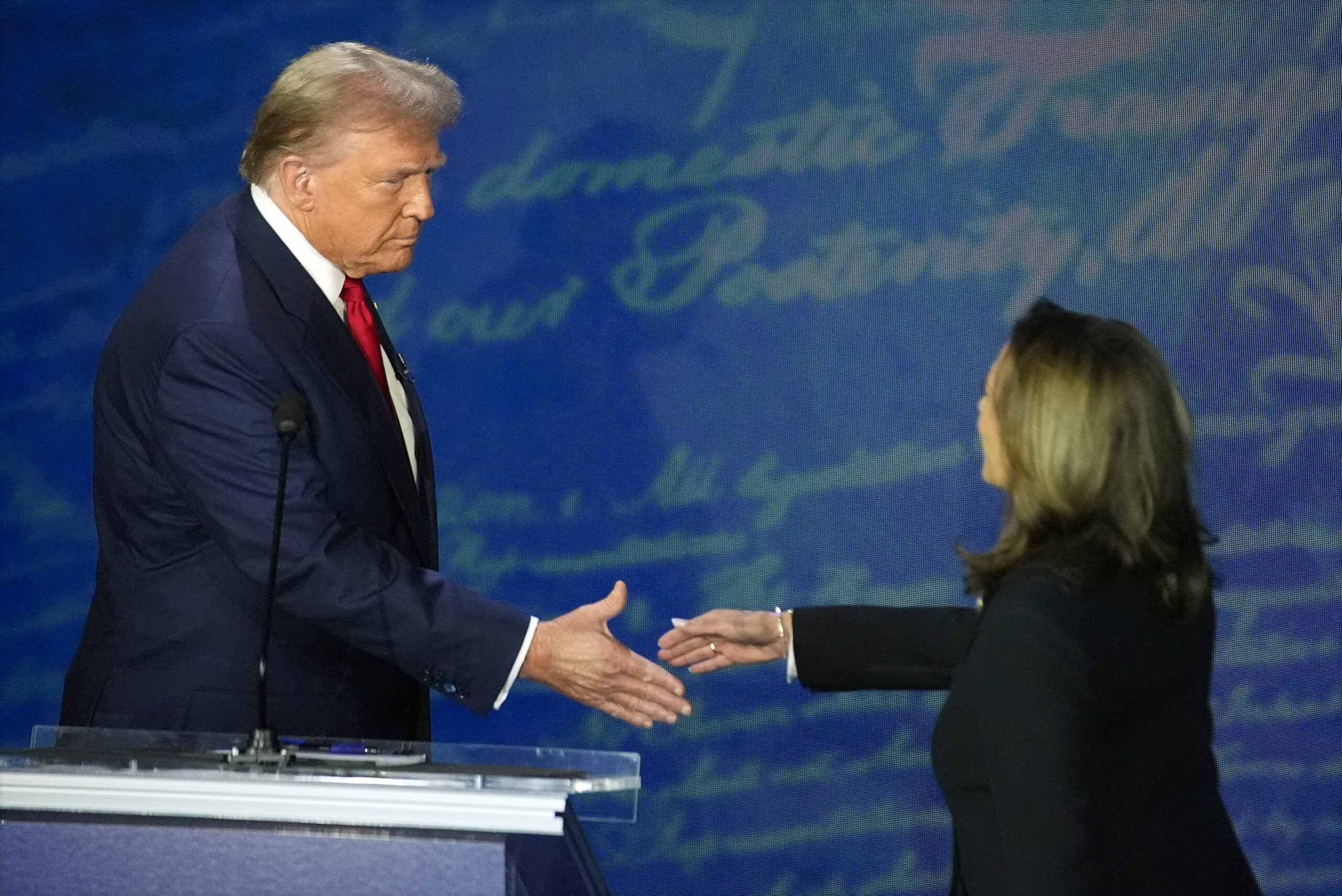Republican presidential nominee former President Donald J. Trump shakes hands with Democratic presidential nominee Vice President Kamala Harris during an ABC News presidential debate at the National Constitution Center, in Philadelphia, September 10. (AP Photo/Alex Brandon)