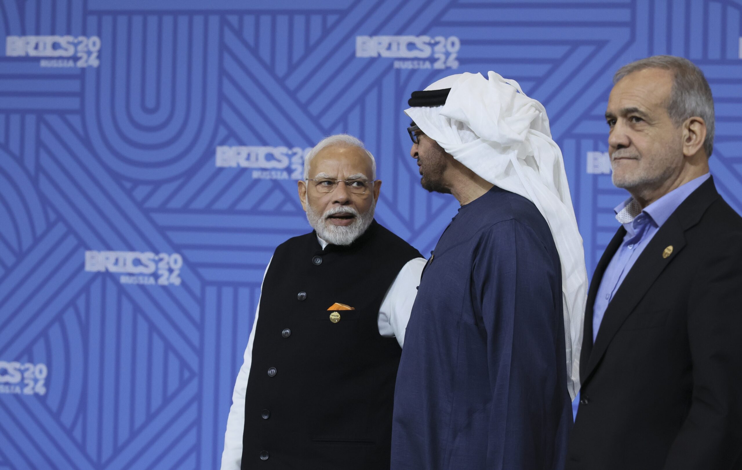 From left: Indian Prime Minister Narendra Modi, United Arab Emirates President Mohammed bin Zayed Al Nahyan and Iranian President Masoud Pezeshkian attend the BRICS Summit plenary session in Kazan, Russia, October 23. (Maxim Shipenkov, Pool Photo via AP)
