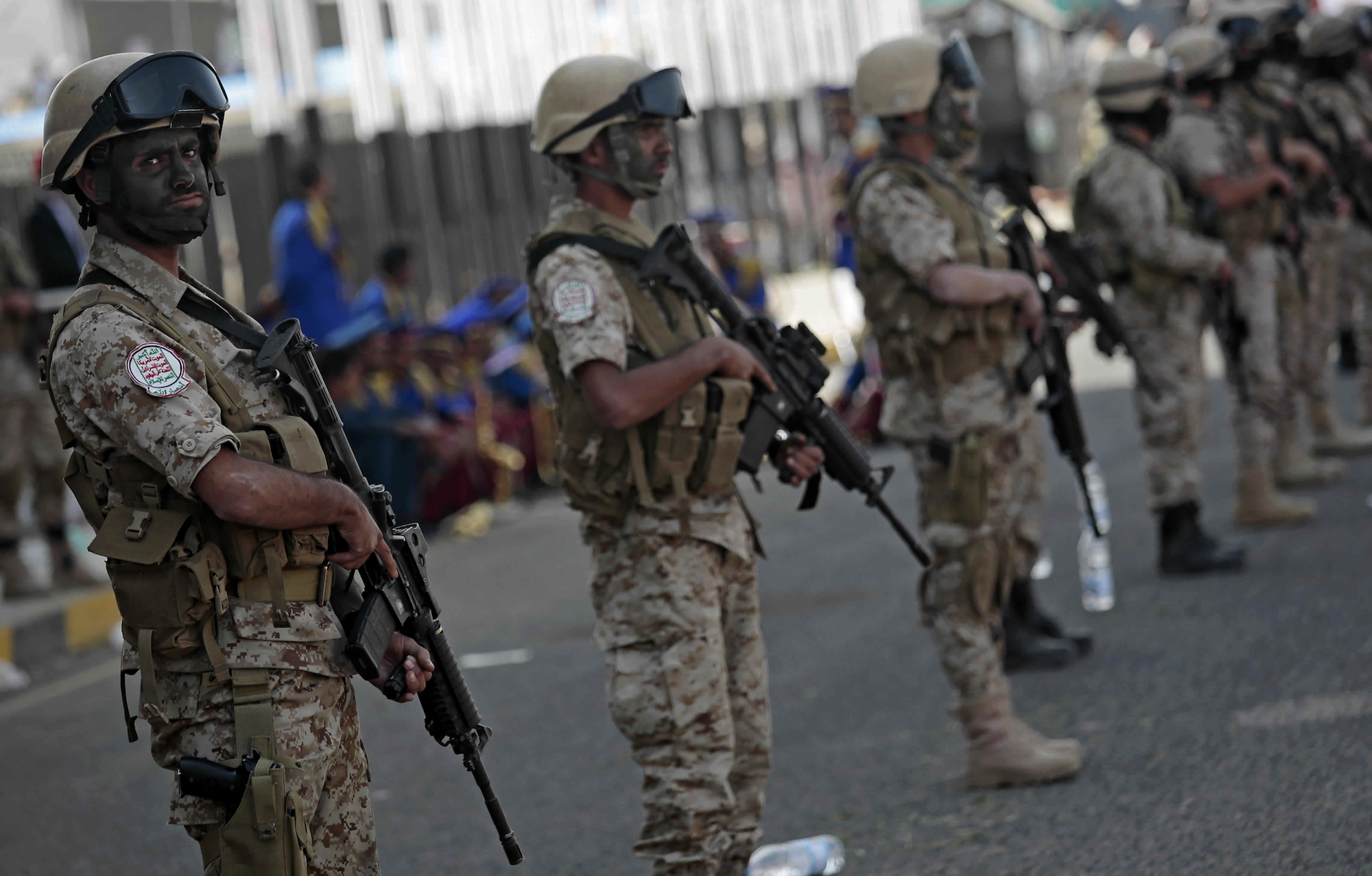 Yemeni Houthi fighters stand guard during a rally in Sanaa, Yemen, Sept. 21, 2017.