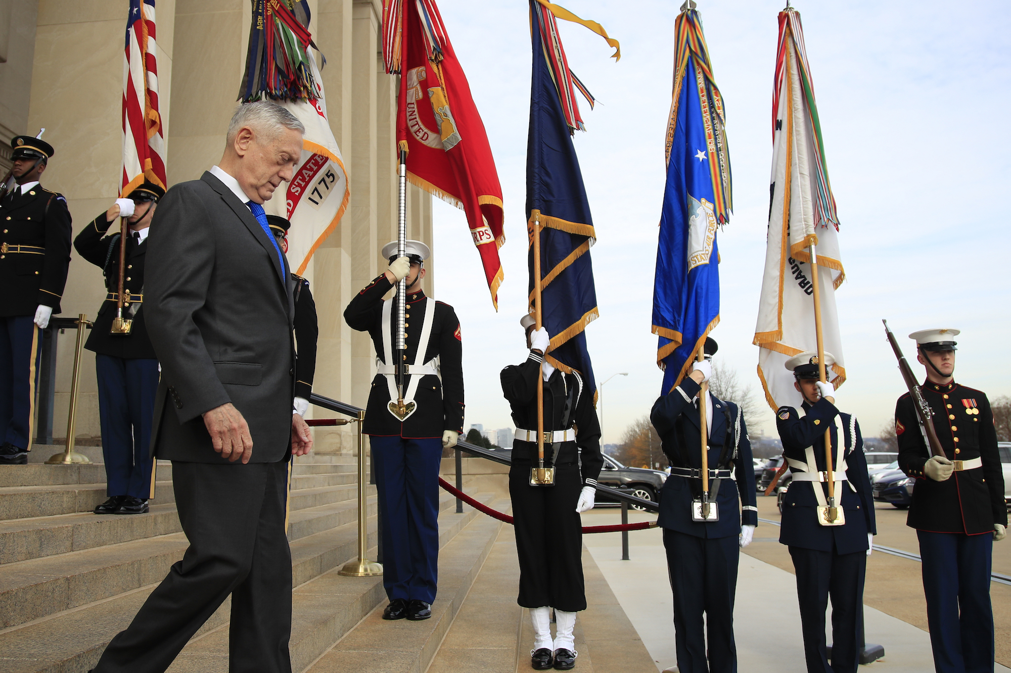 U.S. Defense Secretary Jim Mattis walks down the steps of the Pentagon, Dec. 19. (AP Photo/Manuel Balce Ceneta)