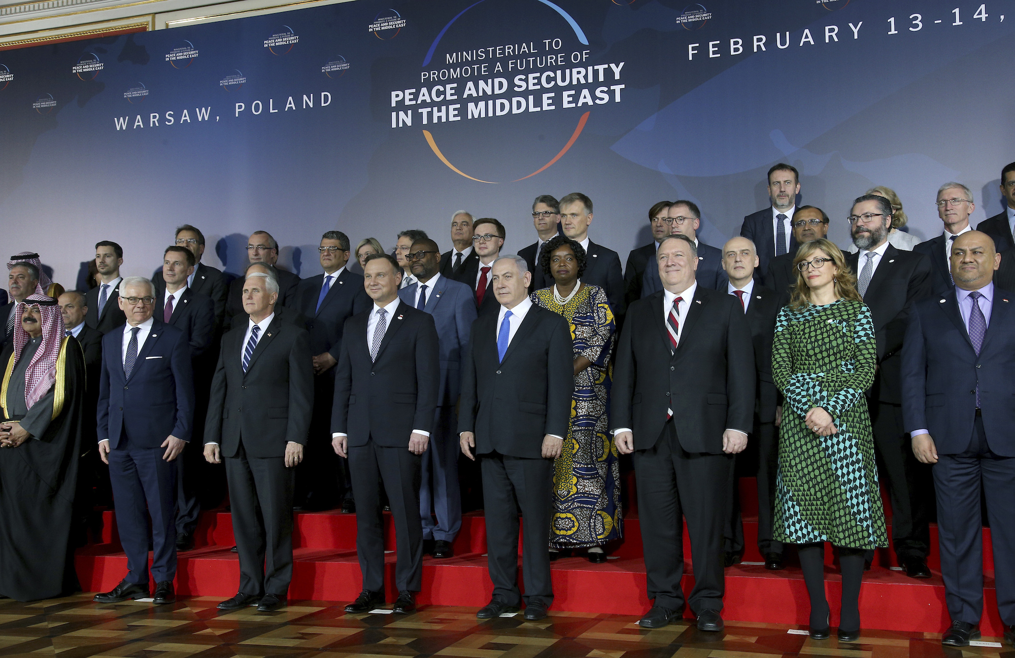 A group photograph of attendees at the U.S.-organized 'Ministerial to Promote a Future of Peace and Security in the Middle East' in Warsaw, Poland, Feb. 13. (AP Photo/Michael Sohn)