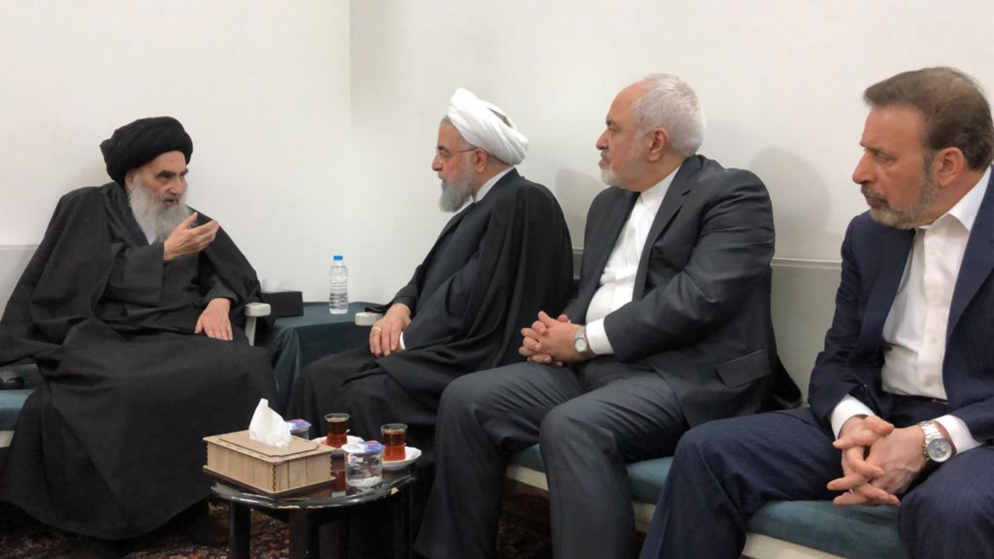 Iranian President Hassan Rouhani, second left, meets with Iraq's Grand Ayatollah Ali al-Sistani, left, accompanied by Iranian Foreign Minister Mohammad Javad Zarif, second right, in Najaf, Iraq, March, 13. (Office of Grand Ayatollah Ali al-Sistani, via AP)