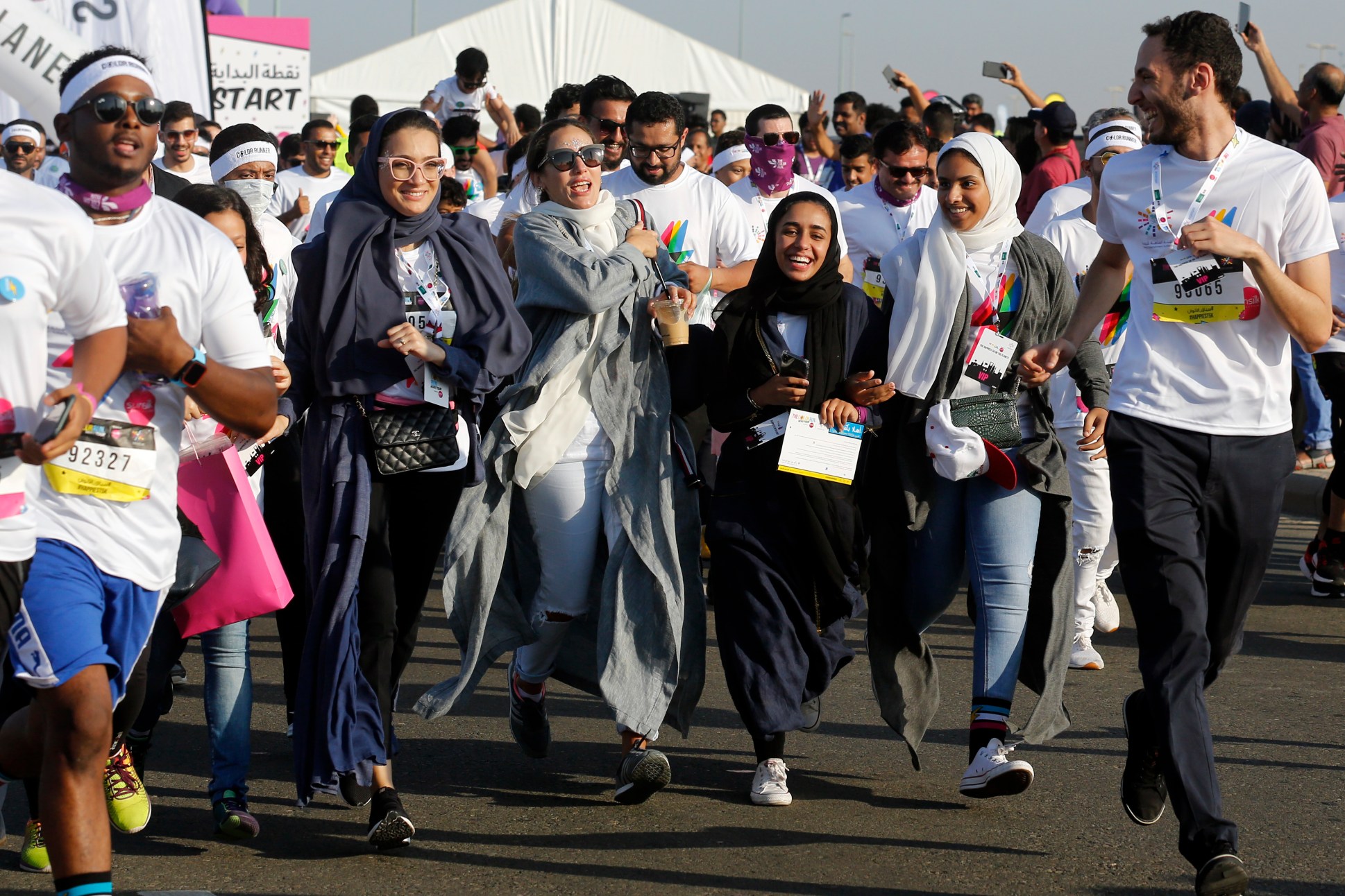 People run during the 'Color Run' in Jeddah, Saudi Arabia, Nov. 2. (AP Photo/Amr Nabil)