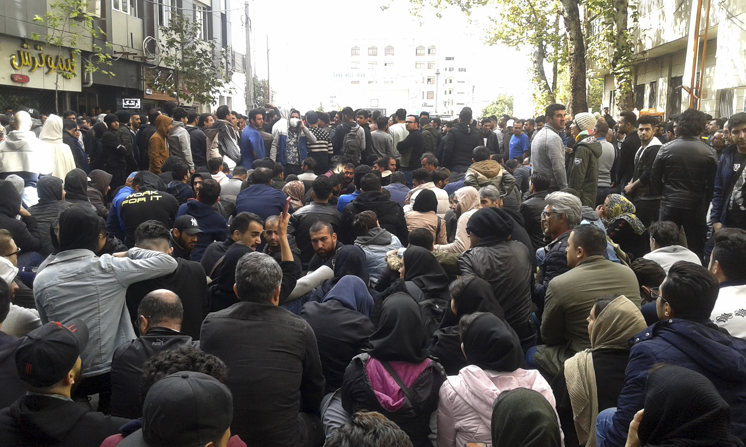 Protestors attend a demonstration after authorities raised gasoline prices, in the northern city of Sari, Iran, Nov. 16, 2019. (Mostafa Shanechi/ ISNA via AP)