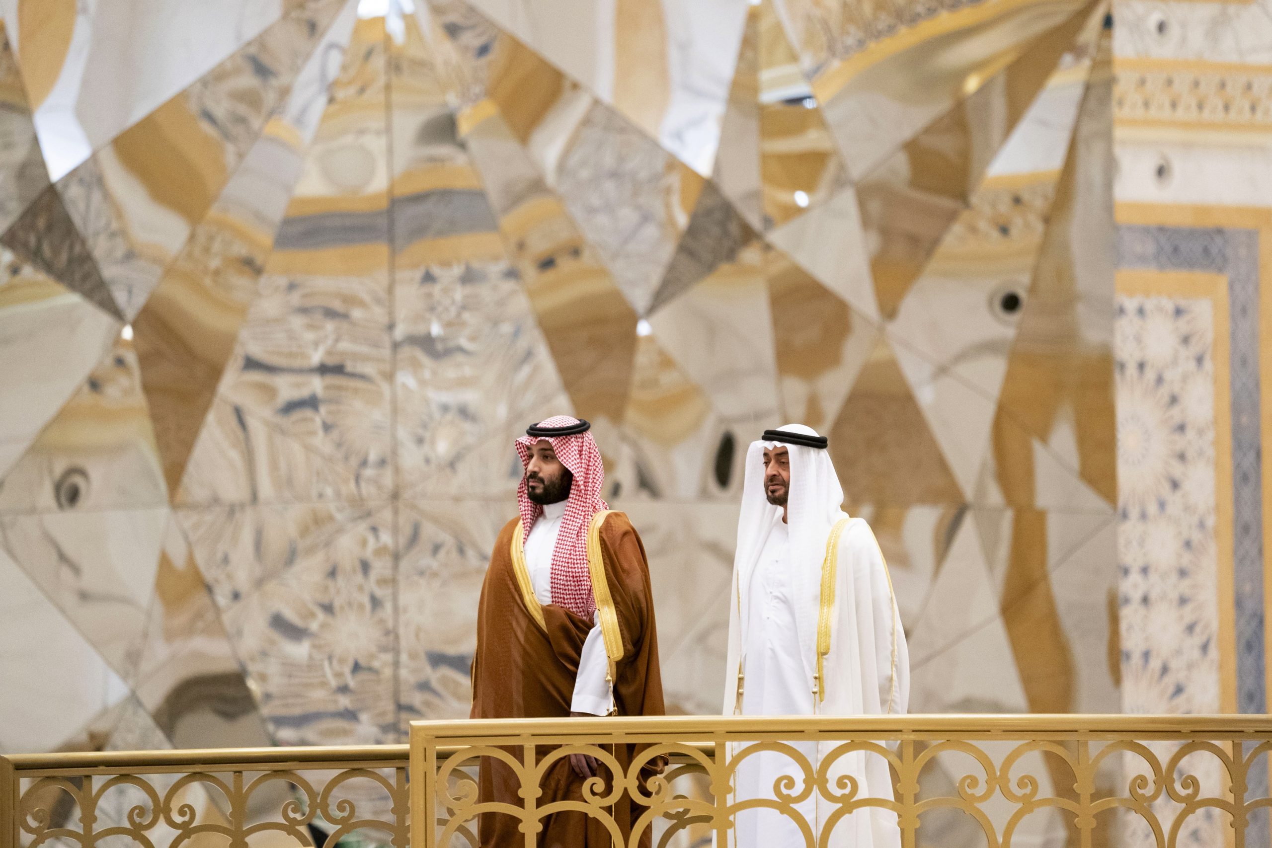 Saudi Crown Prince Mohammed bin Salman, left, attends a ceremony with Abu Dhabi Crown Prince Mohammed bin Zayed al-Nahyan in Abu Dhabi, United Arab Emirates, Nov. 27, 2019. (Mohamed Al Hammadi/Ministry of Presidential Affairs via AP)