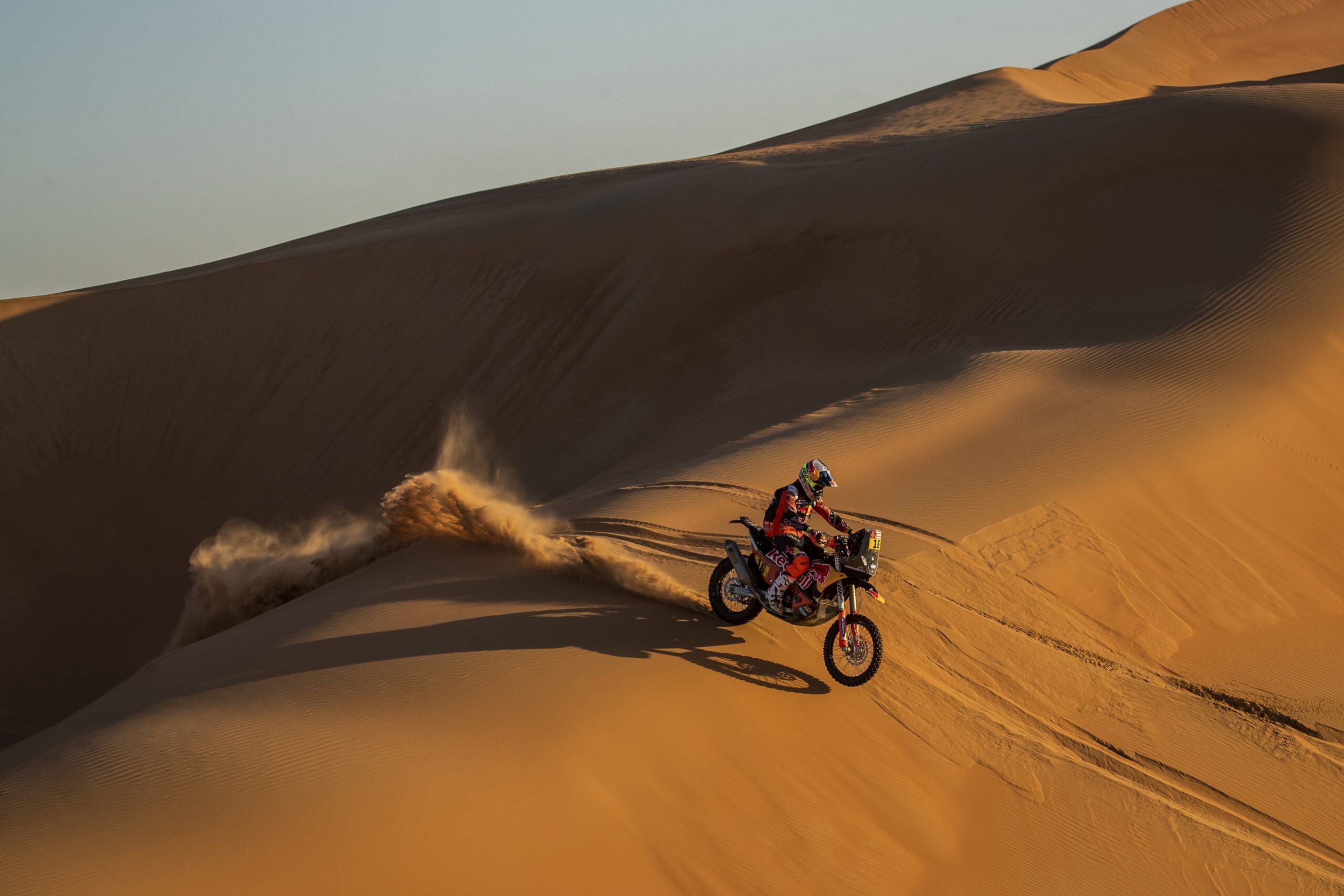 Luciano Benavides of Argentina rides his motorbike during stage 11 of the Dakar Rally between Shubaytah and Haradh, Saudi Arabia, Jan. 16, 2020. (AP Photo/Bernat Armangue)