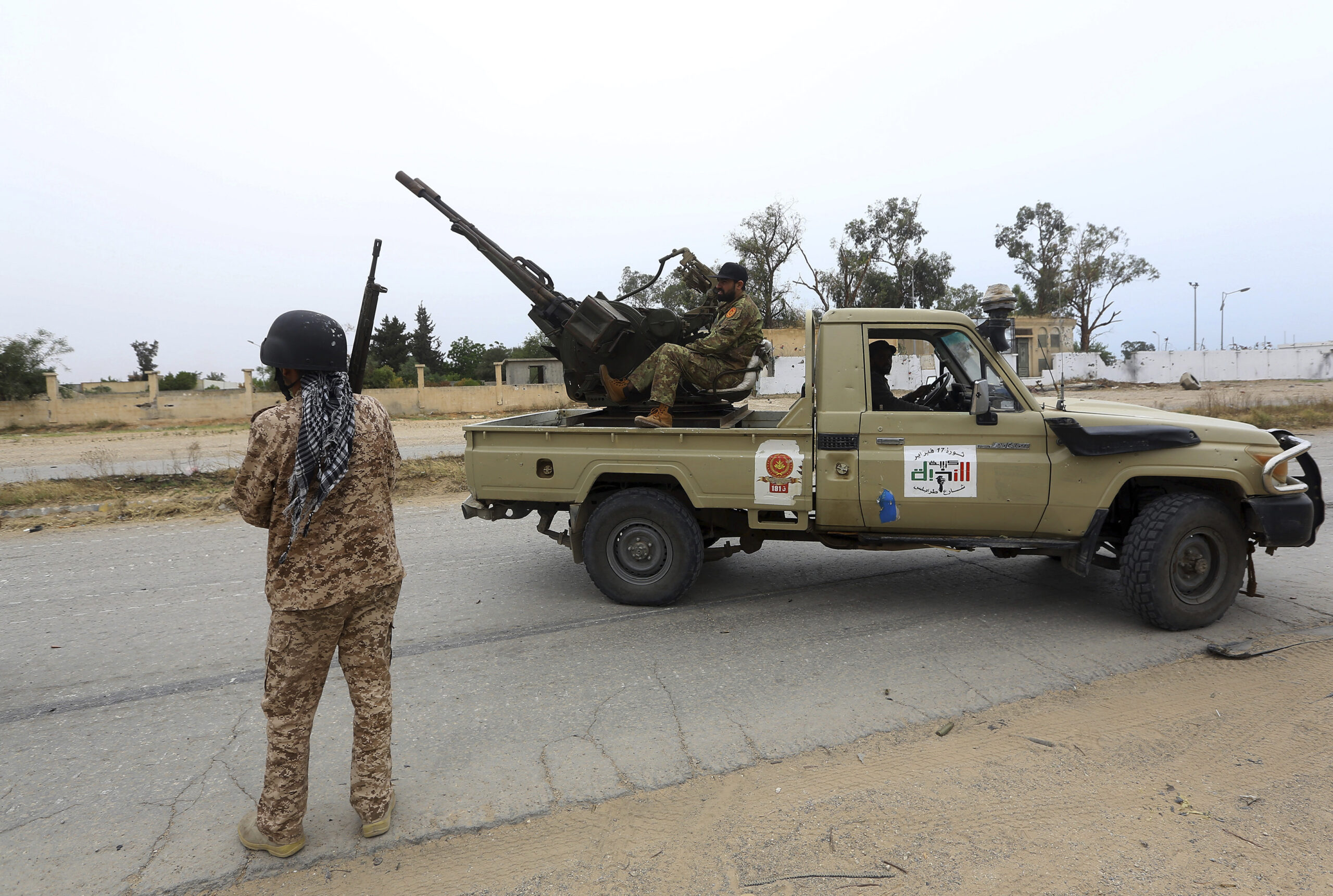 Tripoli government forces clash with forces led by Field Marshal Khalifa Hifter, south of the capital Tripoli, Libya, May 21, 2019. (AP Photo/Hazem Ahmed)