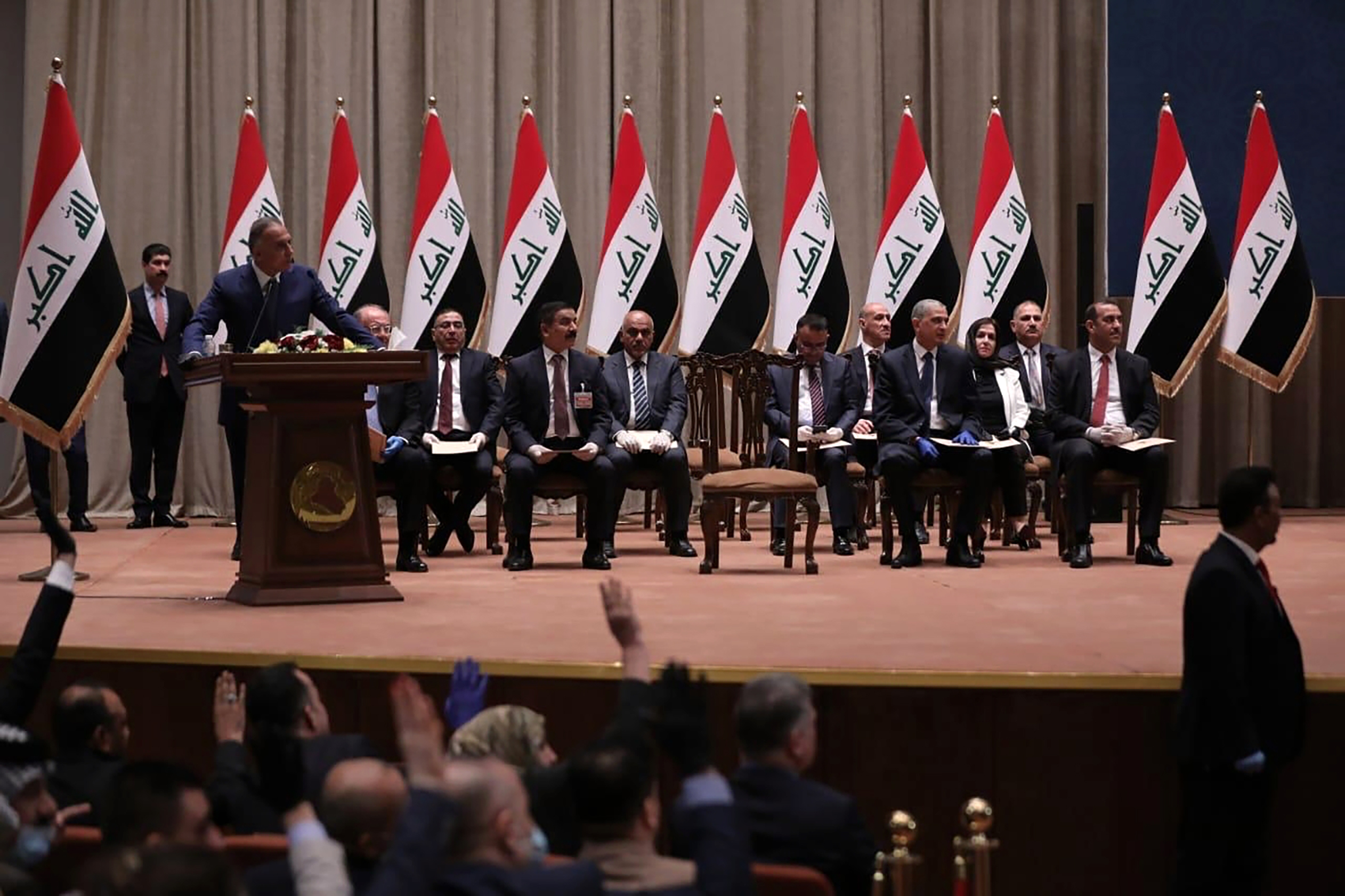 Mustafa al-Kahdimi, Iraq's prime minister, speaks to members of the Iraqi Parliament in Baghdad, Iraq, May 7. (Iraqi Parliament Media Office, via AP)