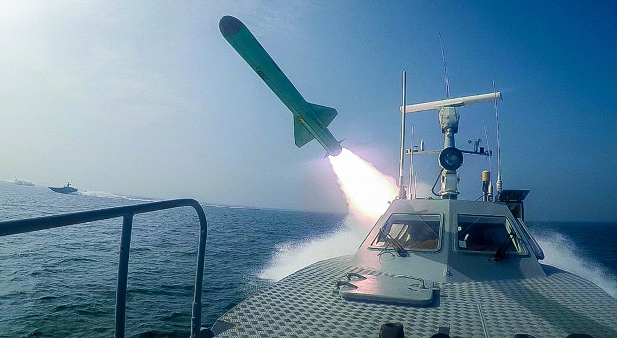 An Islamic Revolutionary Guard Corps speed boat fires a missile during a military exercise, July 28. (Sepahnews via AP)