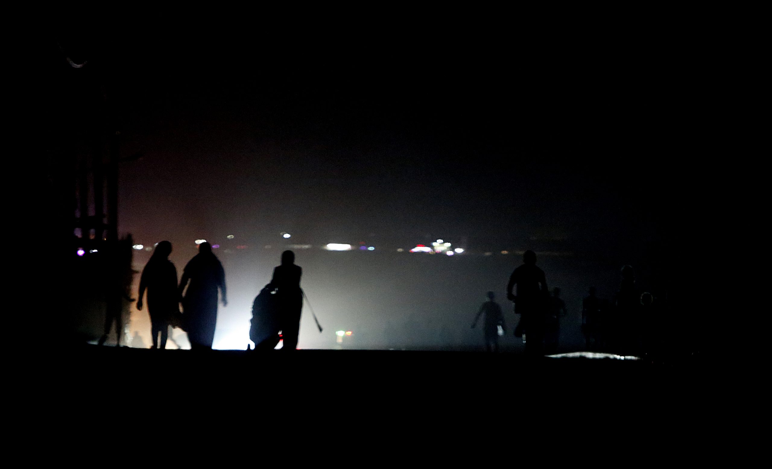 Palestinian residents walk in the Shati refugee camp in Gaza City, Aug. 19, 2020. (AP Photo/Hatem Moussa)