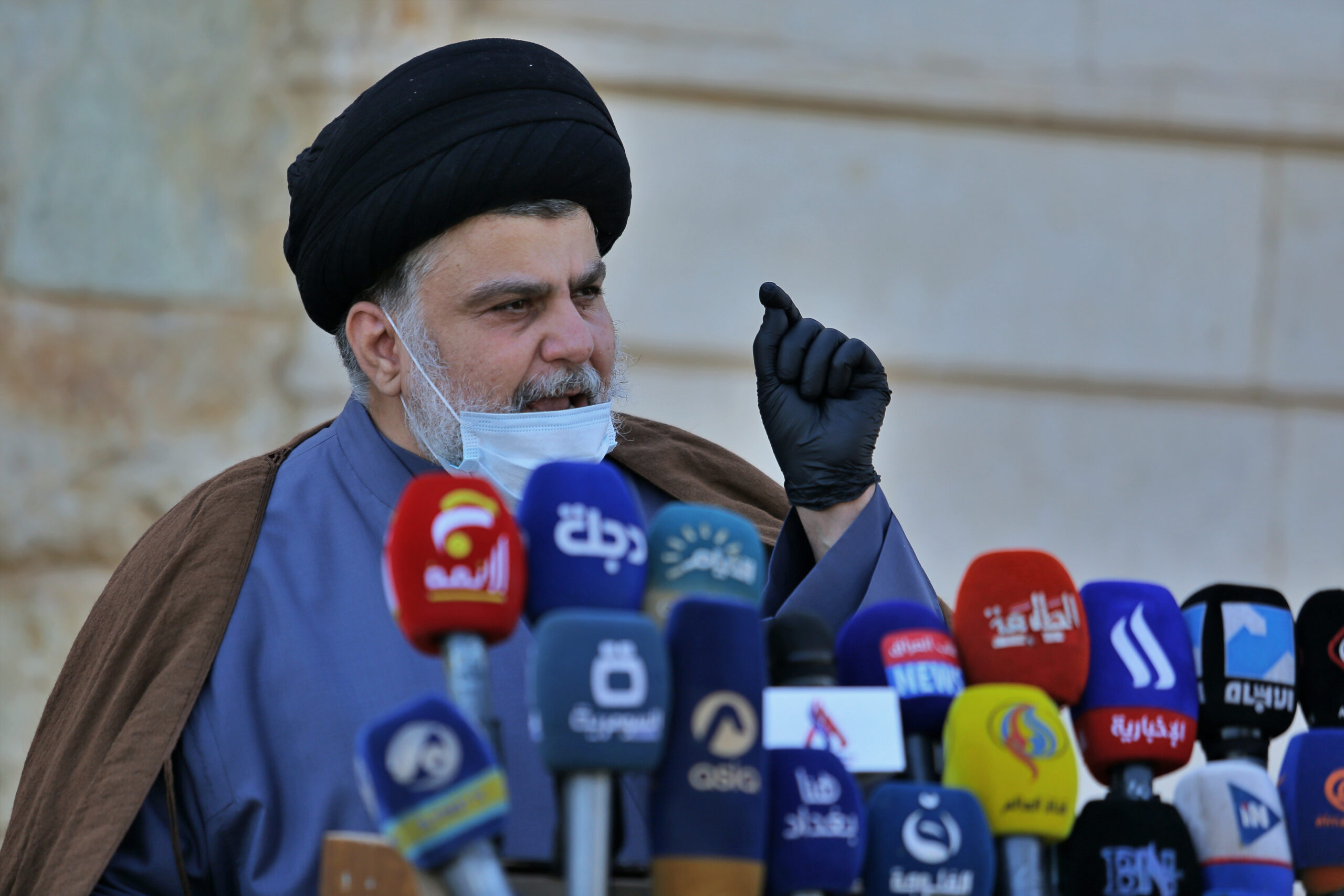 Shia cleric Muqtada al-Sadr speaks during a press conference in Najaf, Iraq, Feb. 10. (AP Photo/Anmar Khalil)