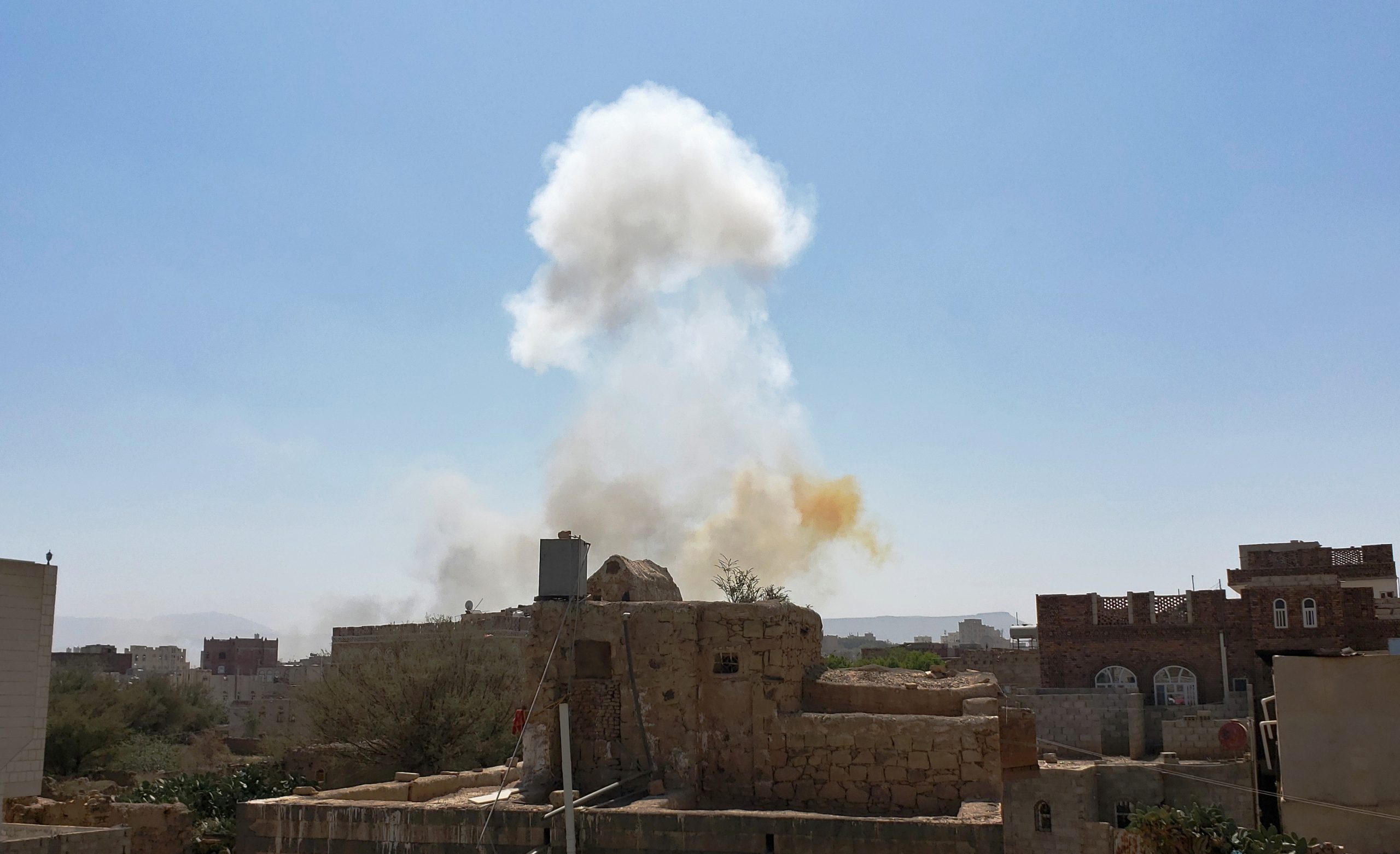 Smoke rises after Saudi-led airstrikes on an army base in Sanaa, Yemen, Mar. 7. (AP Photo/Hani Mohammed)