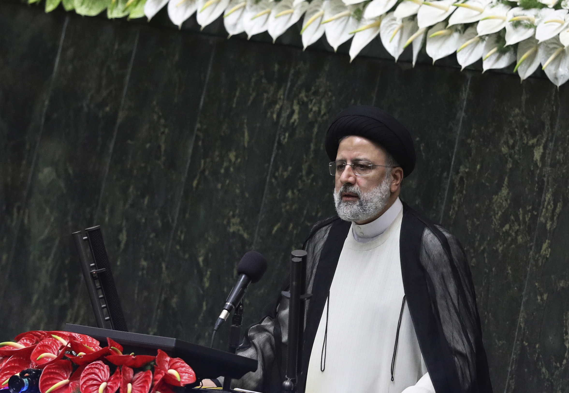 Iranian President Ebrahim Raisi delivers a speech after taking his oath as president in a ceremony at the Parliament in Tehran, Iran, Aug. 5. (AP Photo/Vahid Salemi)