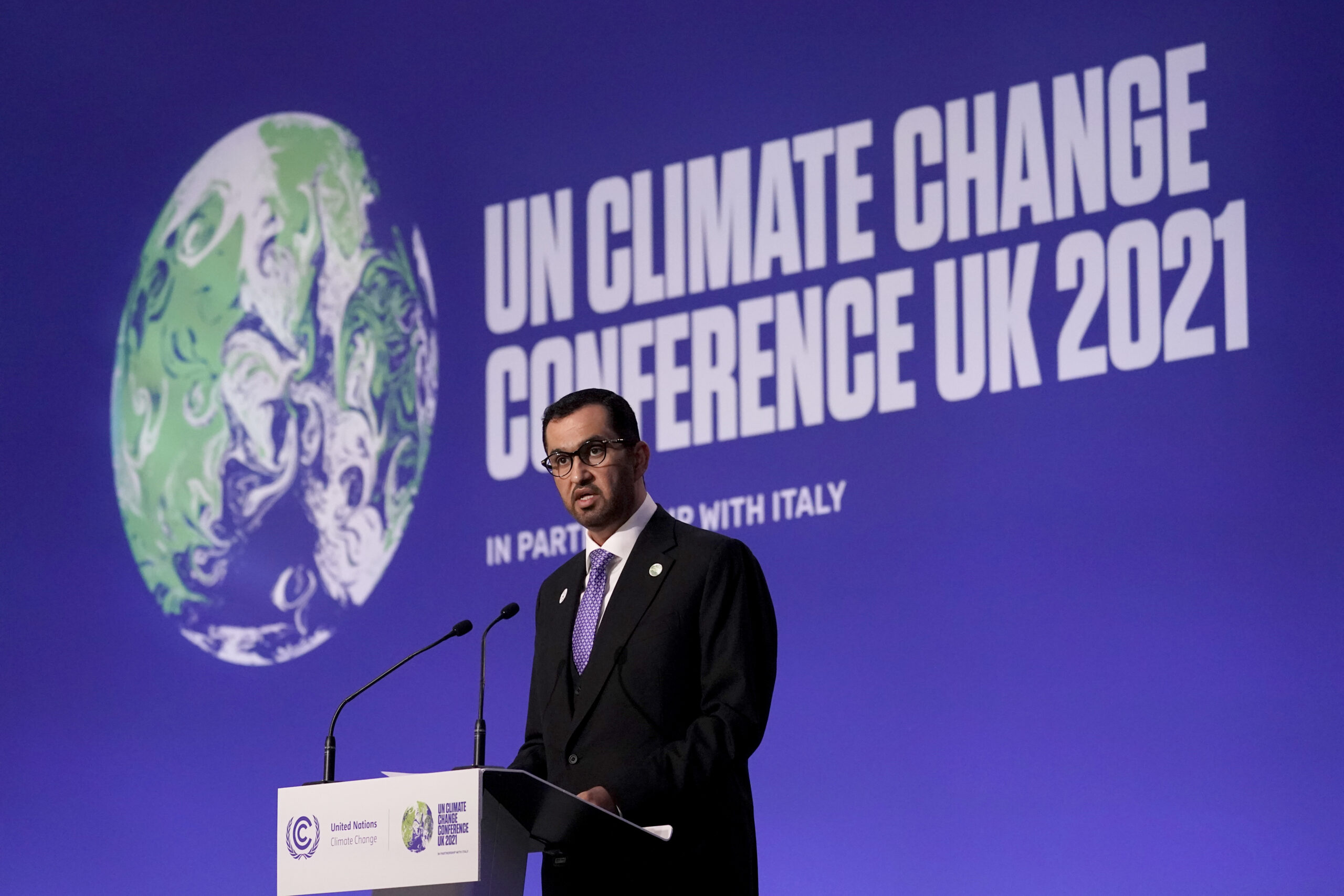Sultan Ahmed Al Jaber, ADNOC CEO and UAE special envoy for climate change, speaks at the United Nations Climate Change Conference, COP26, in Glasgow, Scotland, Nov. 10. (AP Photo/Alberto Pezzali)