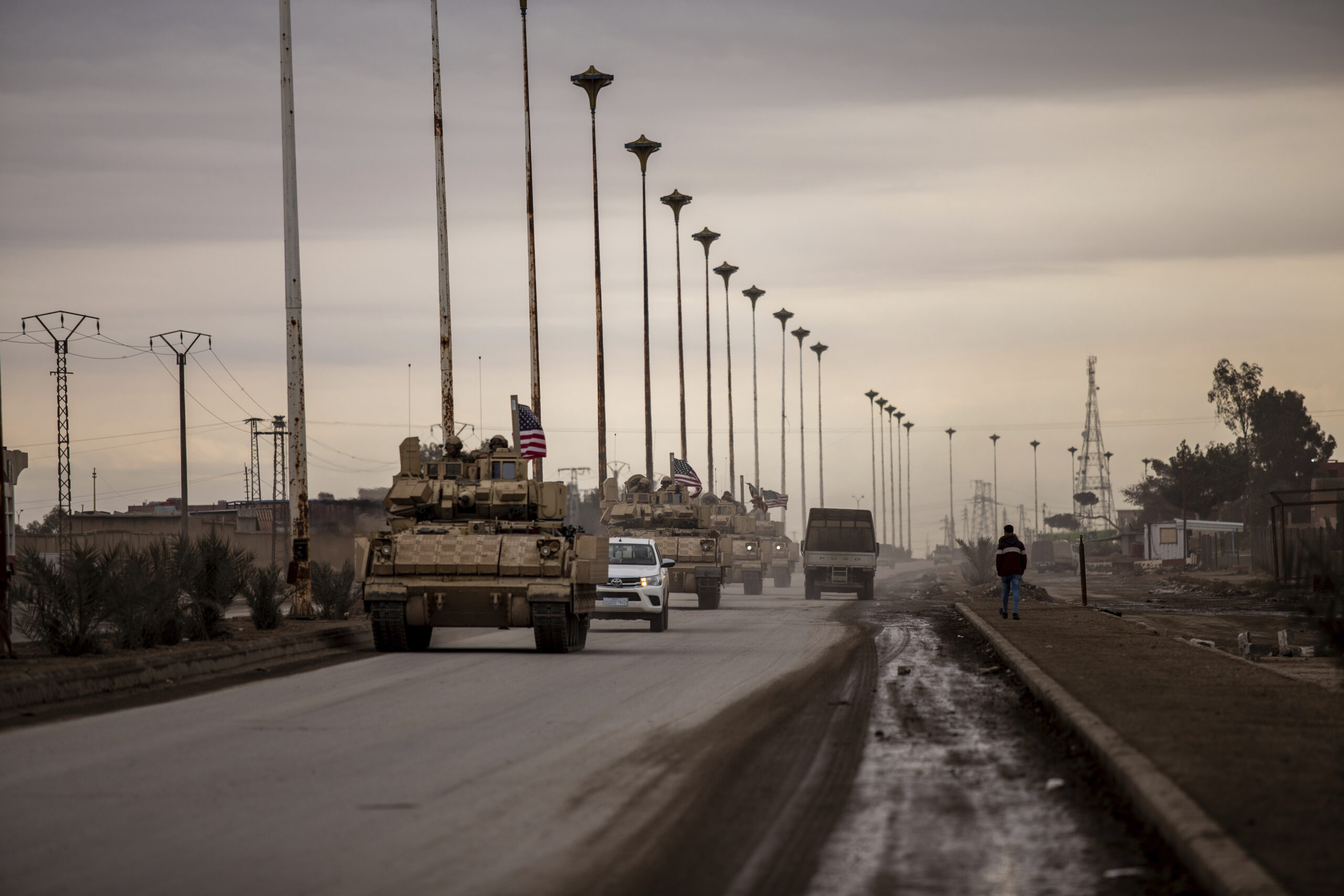 U.S. soldiers patrol near a prison that was attacked by militants from the Islamic State in Iraq and the Levant in Hassakah, Syria, Feb. 8. (AP Photo/Baderkhan Ahmad)