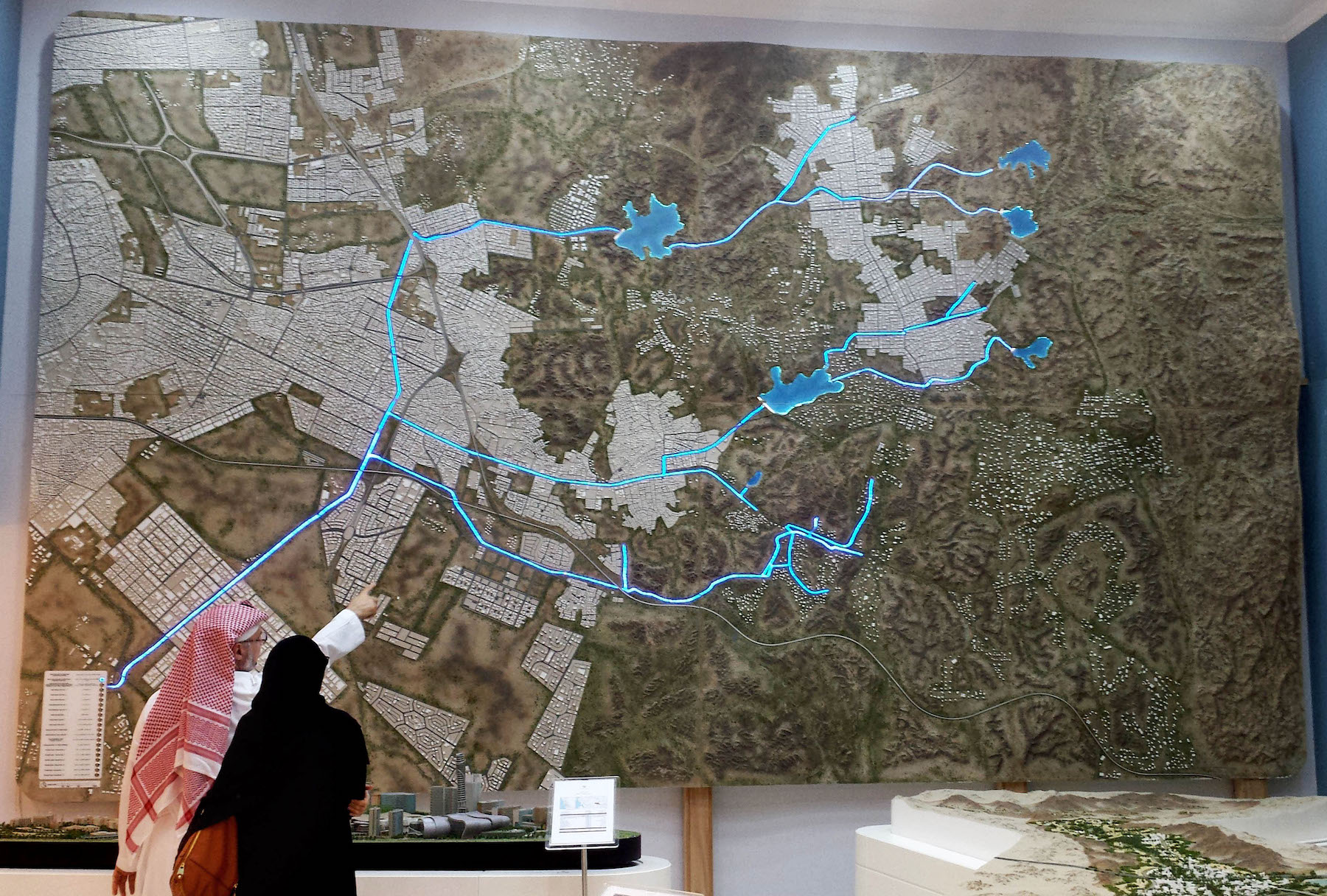 Saudi architect Usamah Shehatah points at a map in the offices of the Jeddah Development and Urban Regeneration Company in Jeddah, Saudi Arabia, Dec. 11, 2013. (AP Photo)