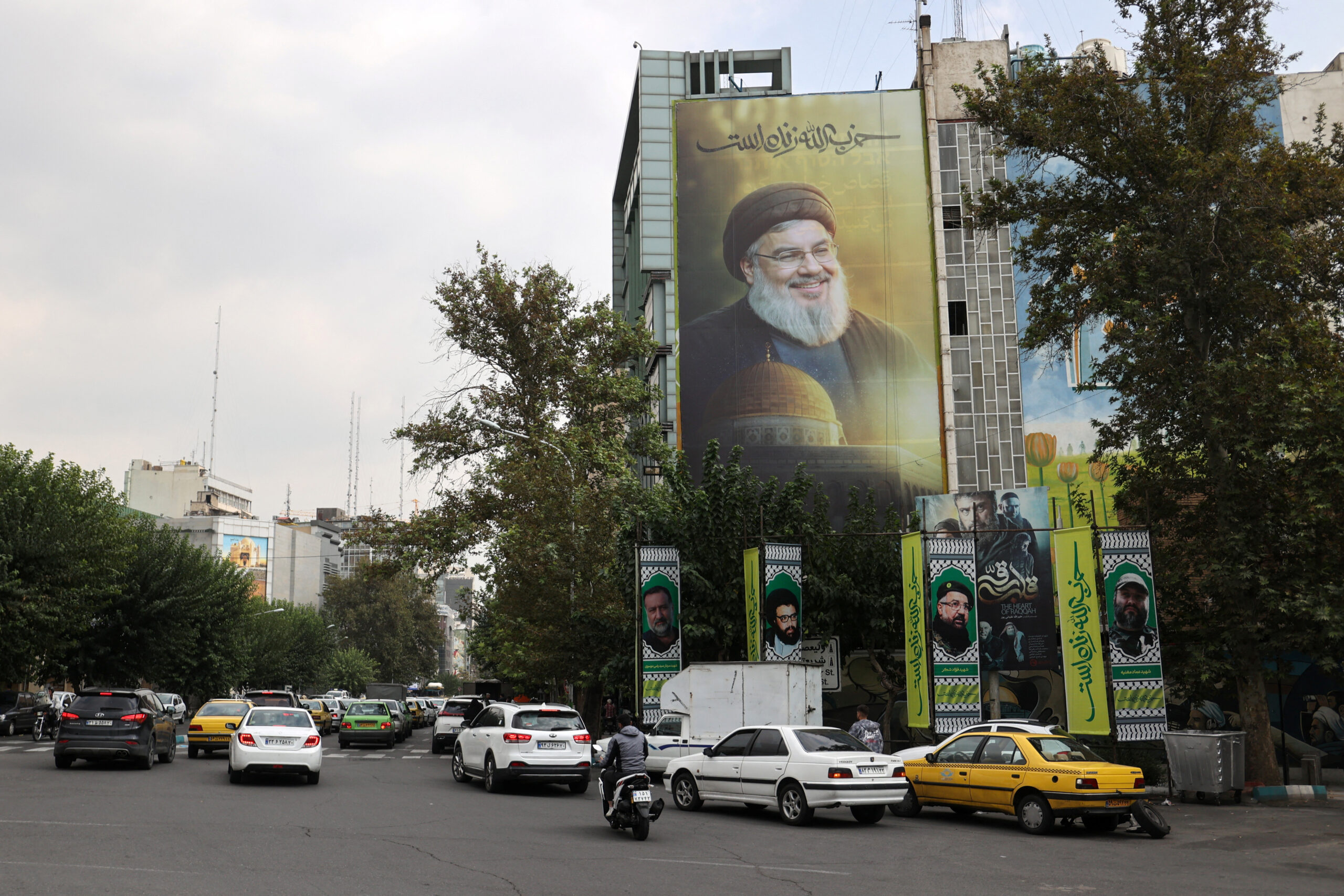A billboard with a picture of the late leader of Lebanese Hezbollah, Hassan Nasrallah, is displayed on a building in Tehran, Iran, September 29. (Majid Asgaripour/West Asia News Agency via REUTERS)