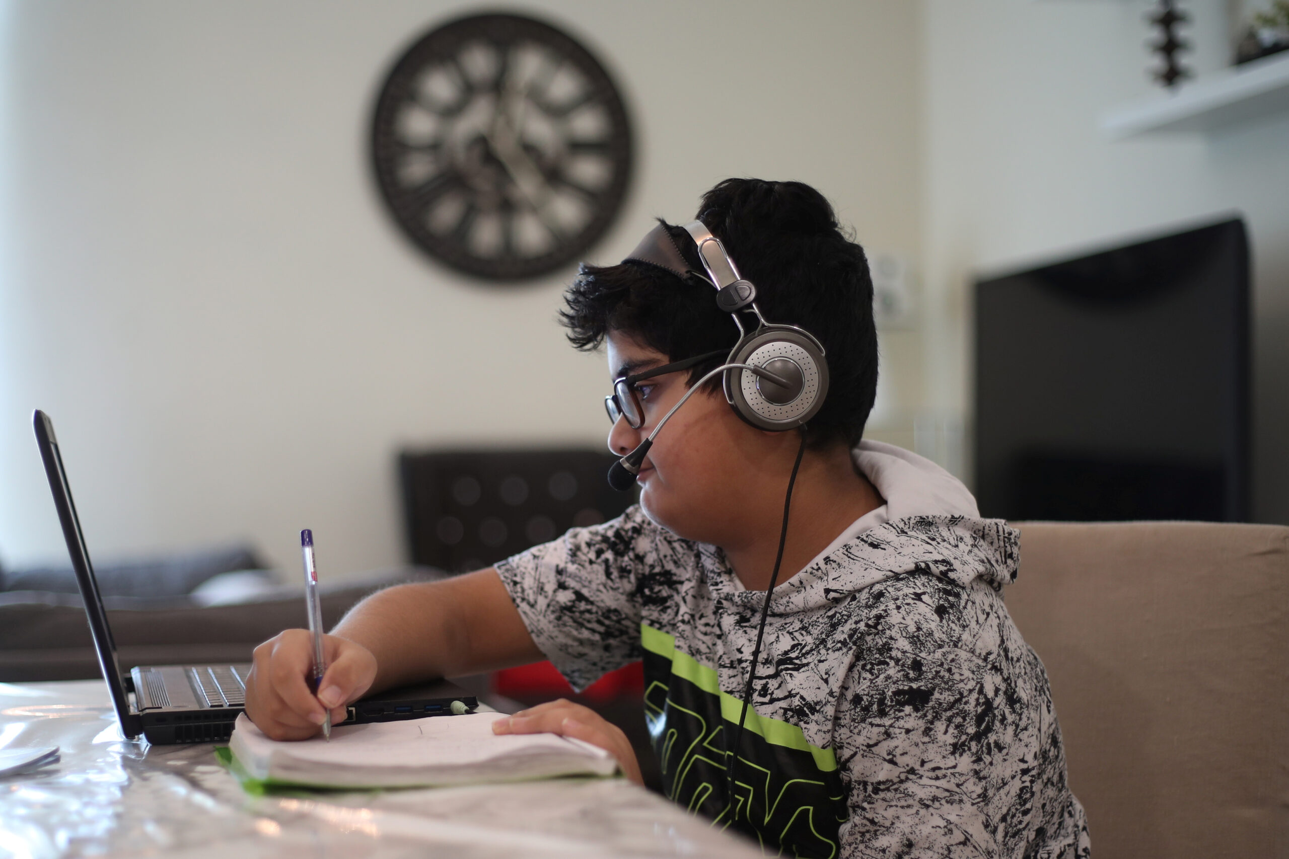 A Bahraini student from a government school attends online schooling from home following the outbreak of the coronavirus pandemic, in Manama, Bahrain, March 25, 2020. (REUTERS/Hamad I Mohammed)