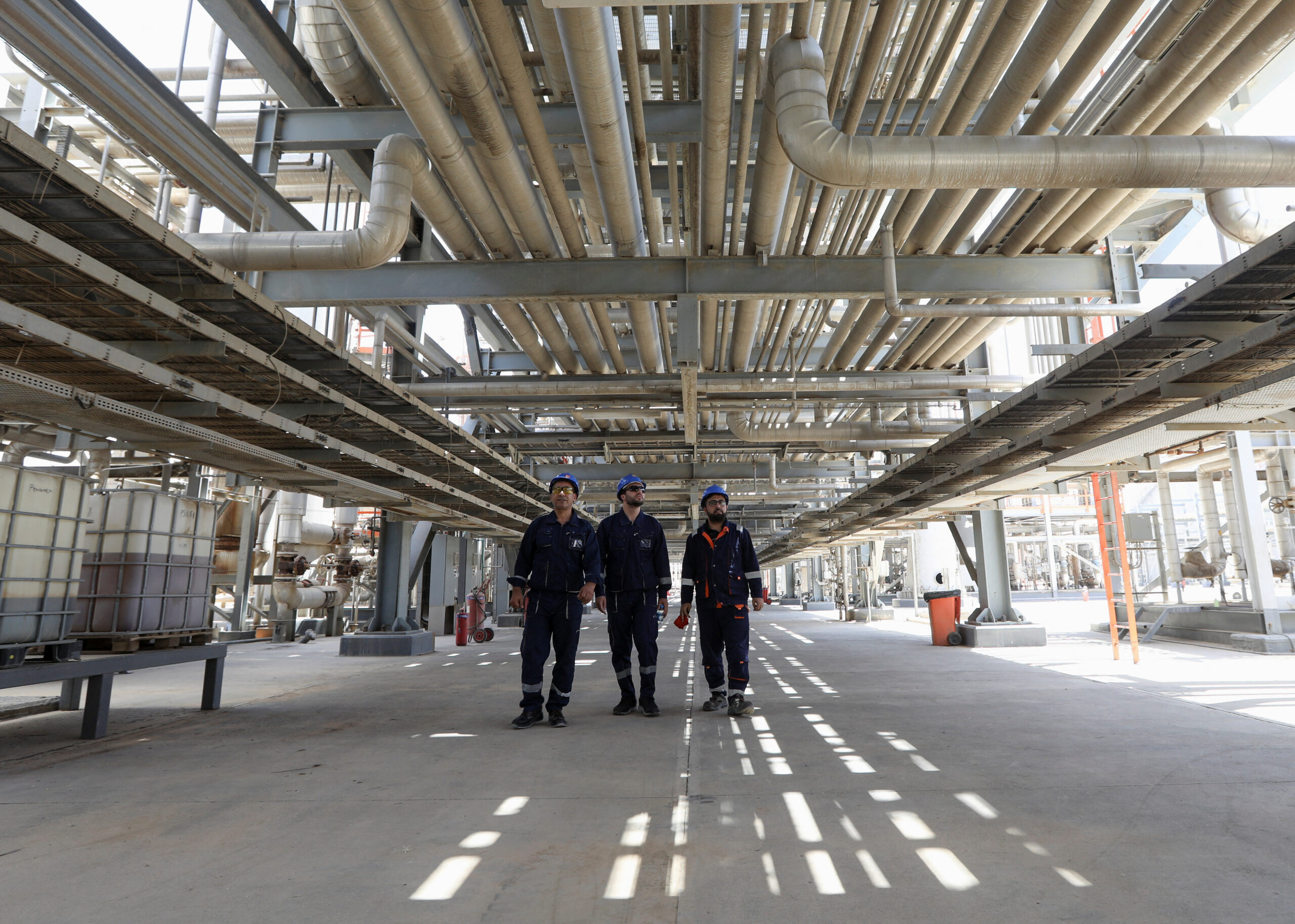 Workers walk at the facilities of the Kurdish oil company KAR, in Erbil, Iraq, July 21. (REUTERS/Ako Rasheed )