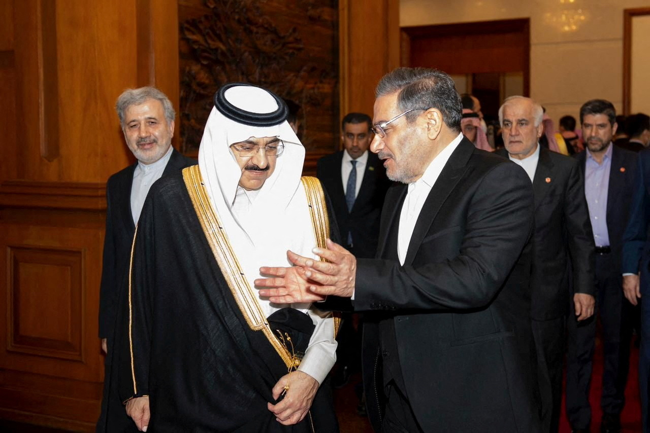 Saudi Minister of State and National Security Advisor Musaad bin Mohammed Al Aiban meets Admiral Ali Shamkhani, the secretary of Iran's Supreme National Security Council, in Beijing, China, March 10. (Saudi Press Agency/Handout via REUTERS)