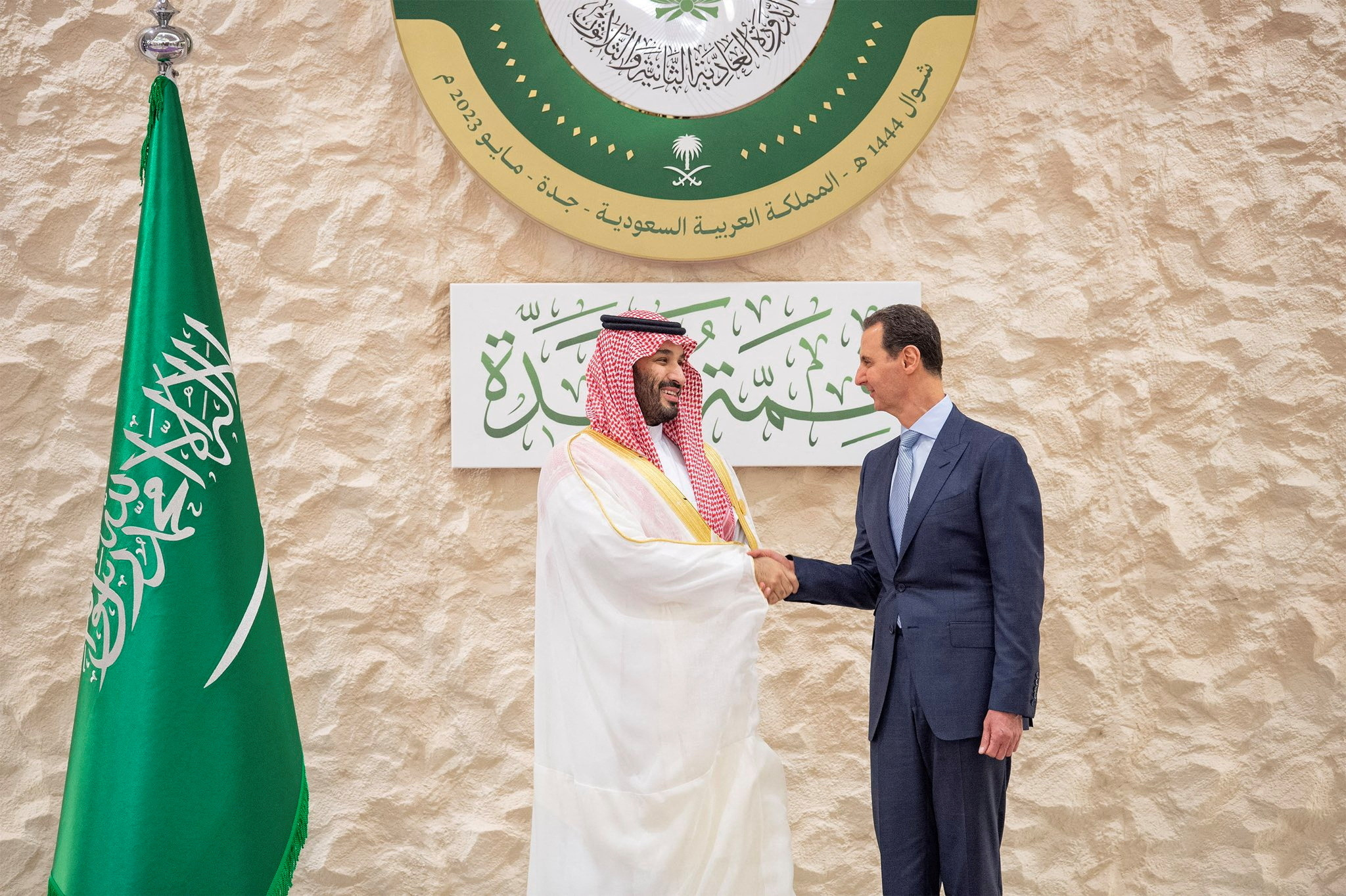Saudi Crown Prince Mohammed bin Salman shakes hands with Syrian President Bashar al-Assad ahead of the Arab League summit in Jeddah, Saudi Arabia, May 19. (Bandar Algaloud/Courtesy of Saudi Royal Court/Handout via REUTERS)
