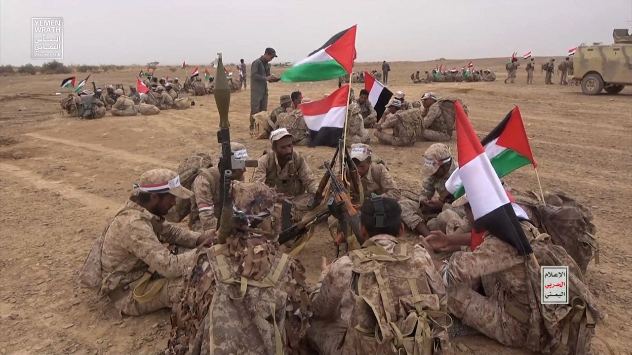 Houthi fighters gather during a military maneuver near Sanaa, Yemen, October 30. (Houthi Media Center/Handout via REUTERS)