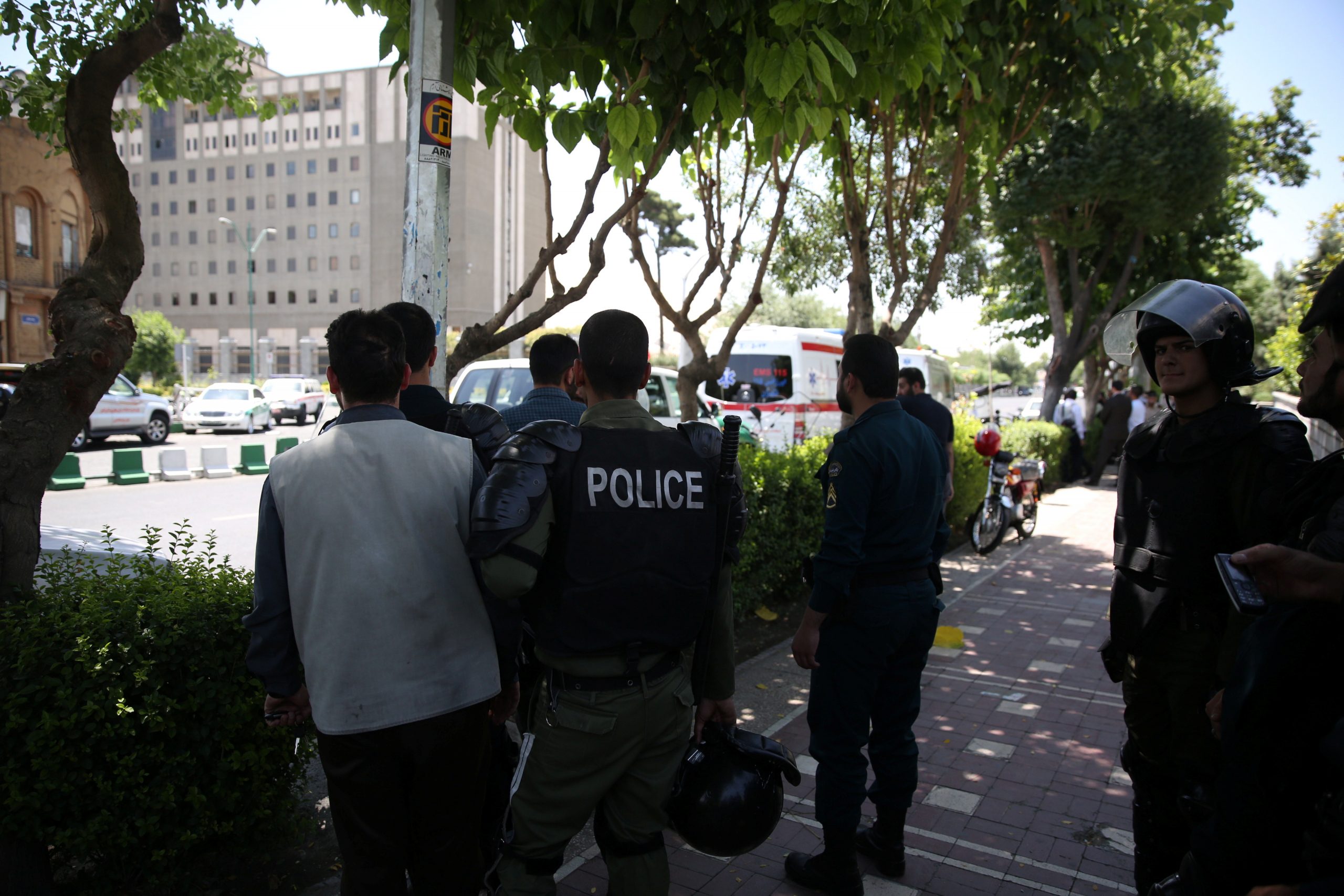 Iranian police stand near the Parliament's building during a gunmen attack in central Tehran, Iran, June 7, 2017. (TIMA via REUTERS)